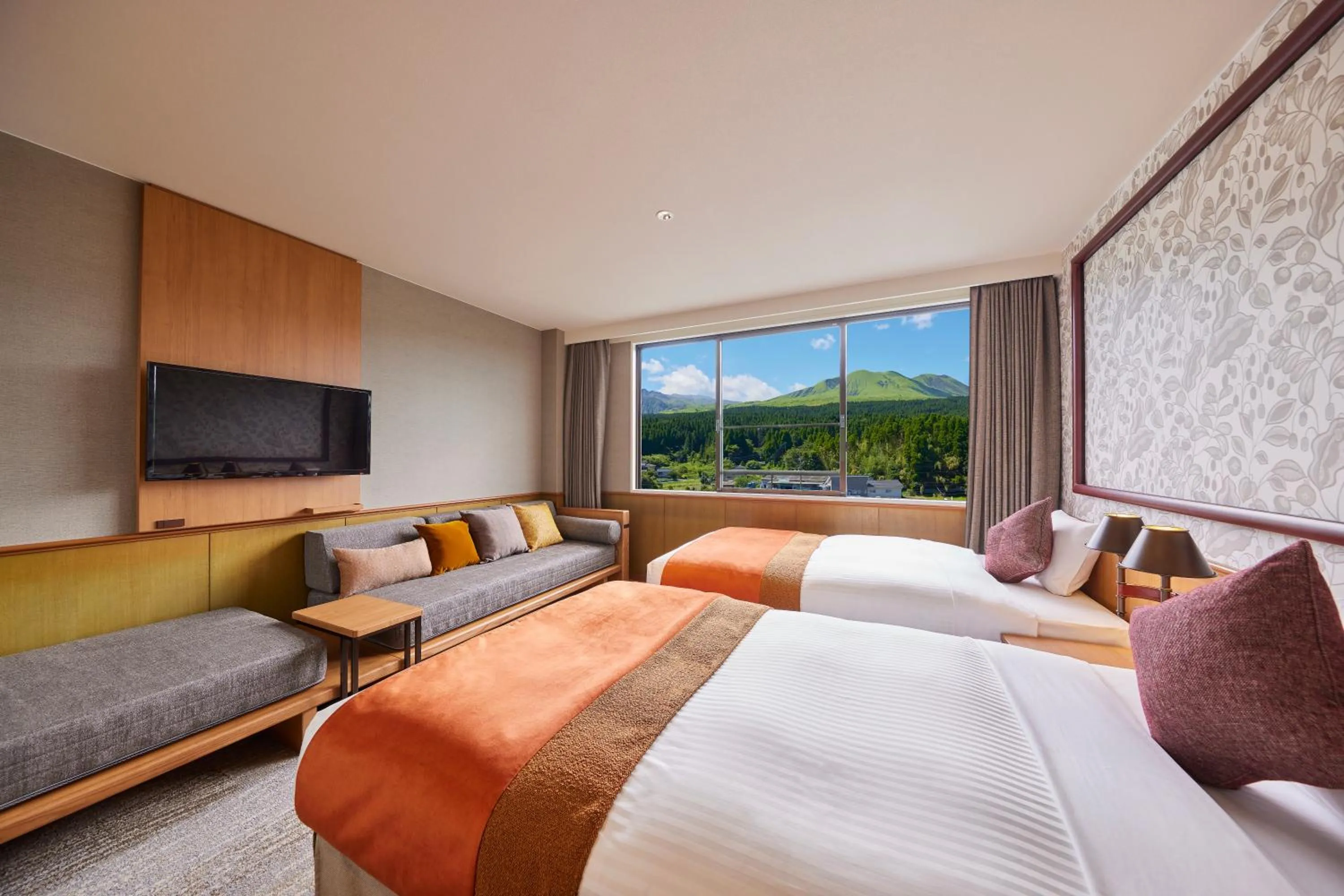 Living room, Bed in Kamenoi Hotel Aso Park Resort