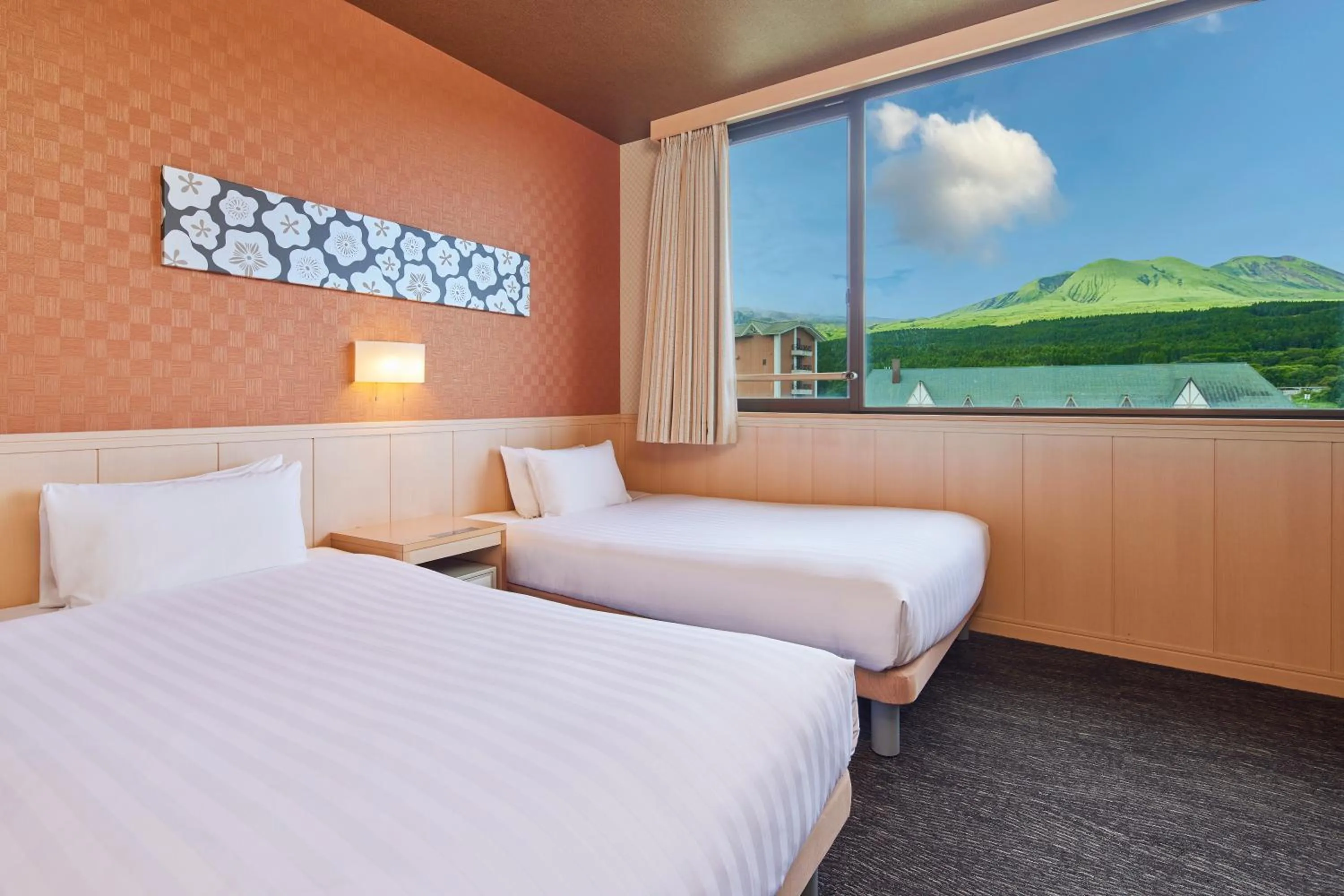 Bed in Kamenoi Hotel Aso Park Resort