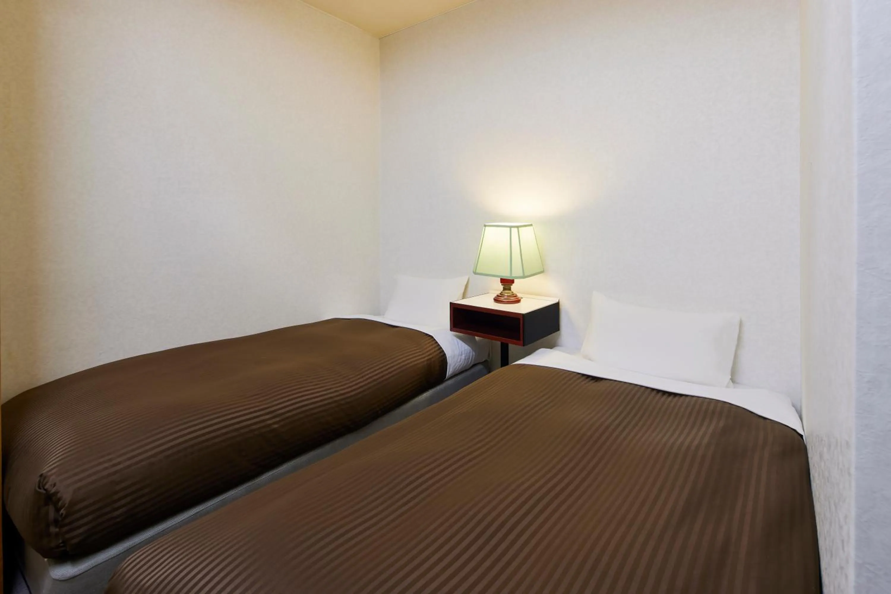 Bedroom, Bed in Kamenoi Hotel Aso Park Resort