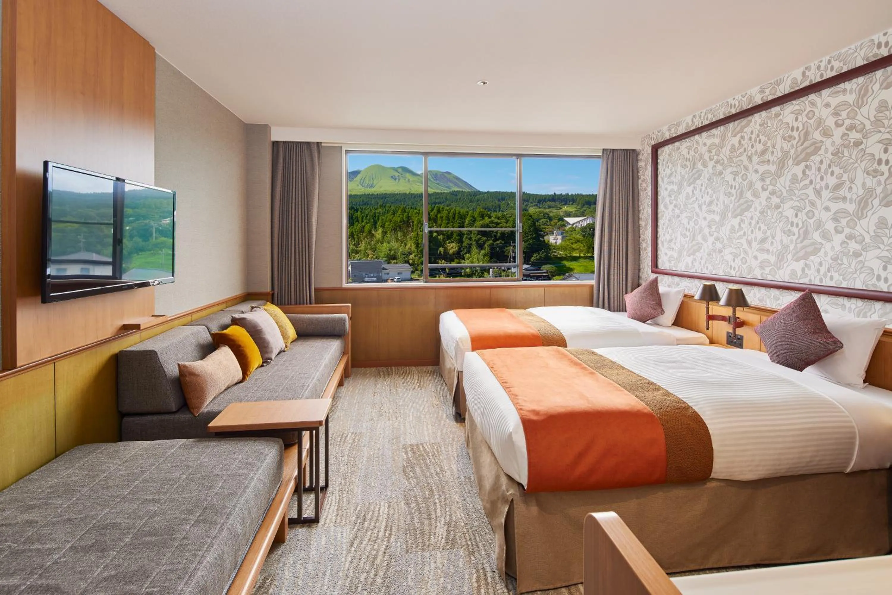 Living room, Bed in Kamenoi Hotel Aso Park Resort