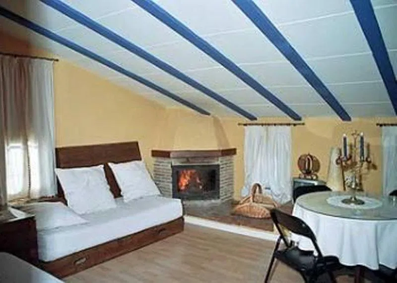 Living room, Bed in Casa Rural Jose Trullenque