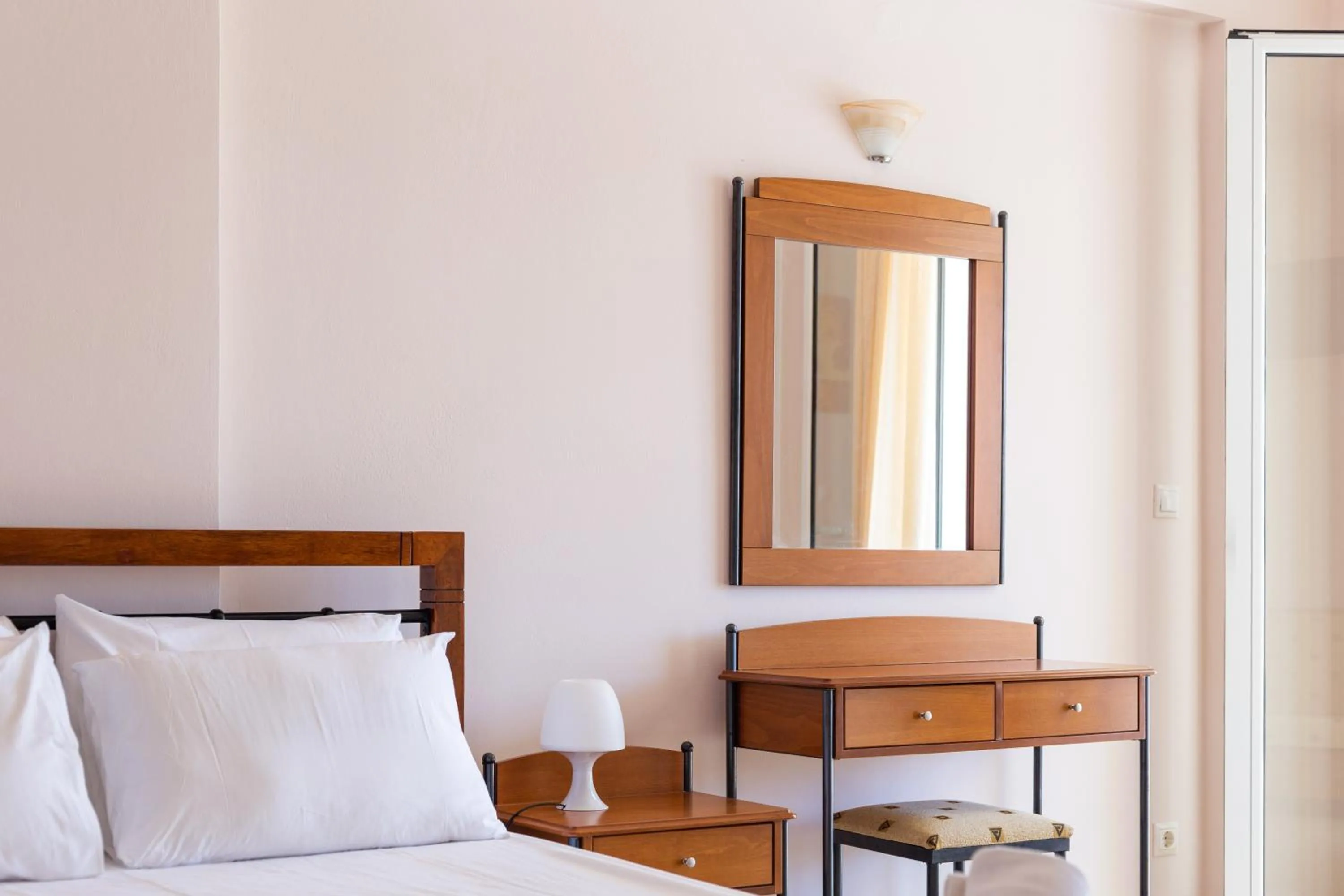 Bed in Hotel Aphrodite