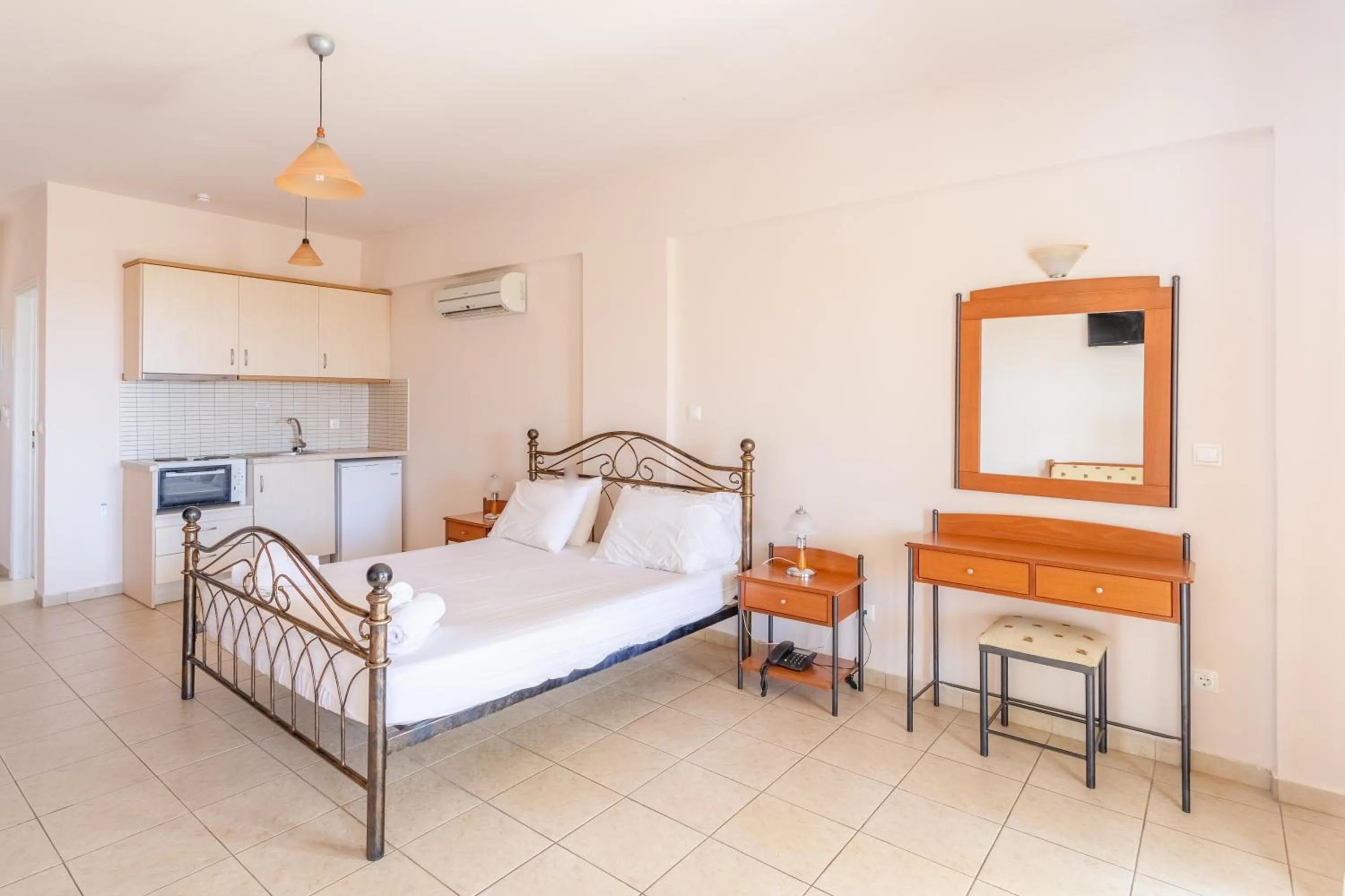 Bed in Hotel Aphrodite