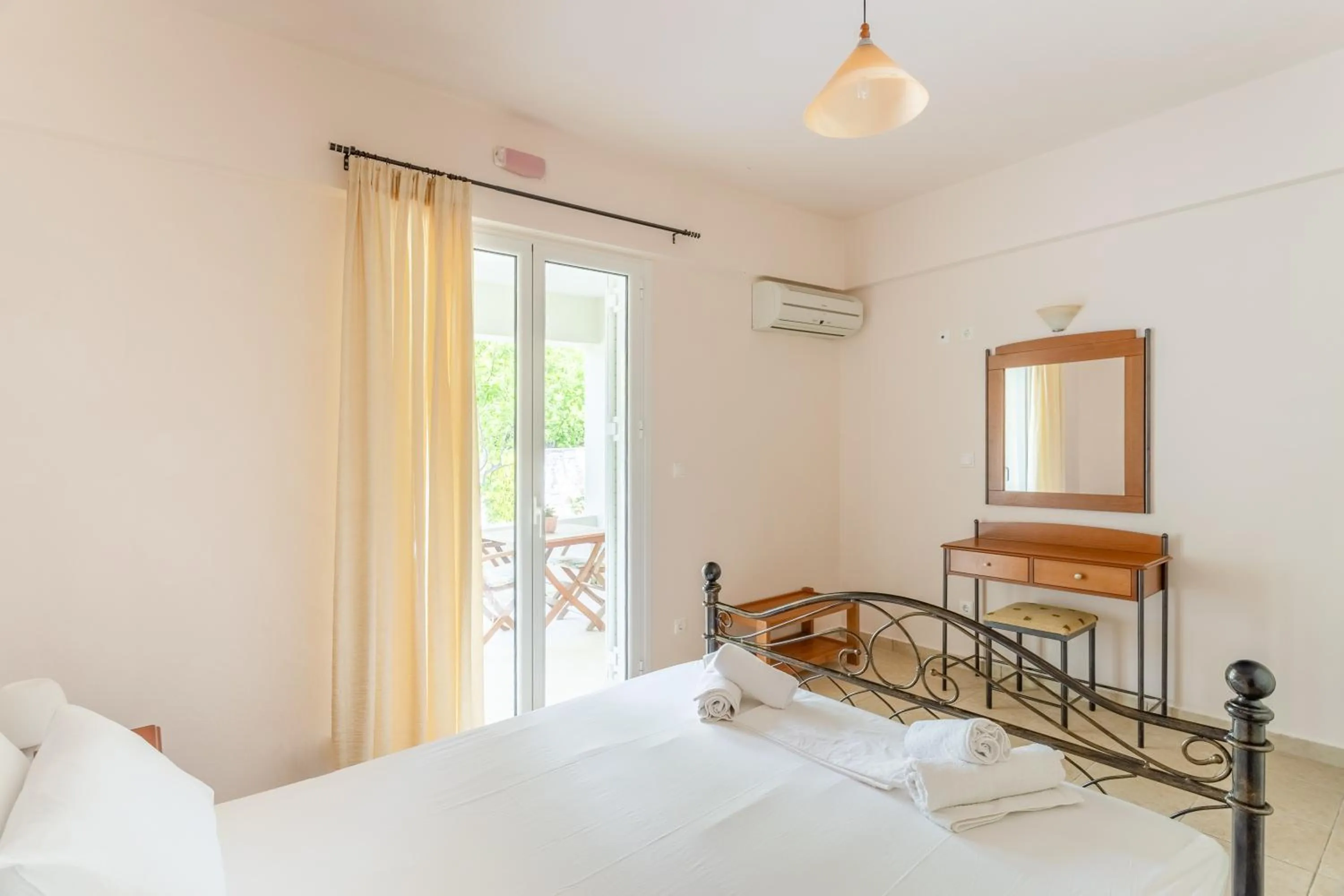 Bed in Hotel Aphrodite