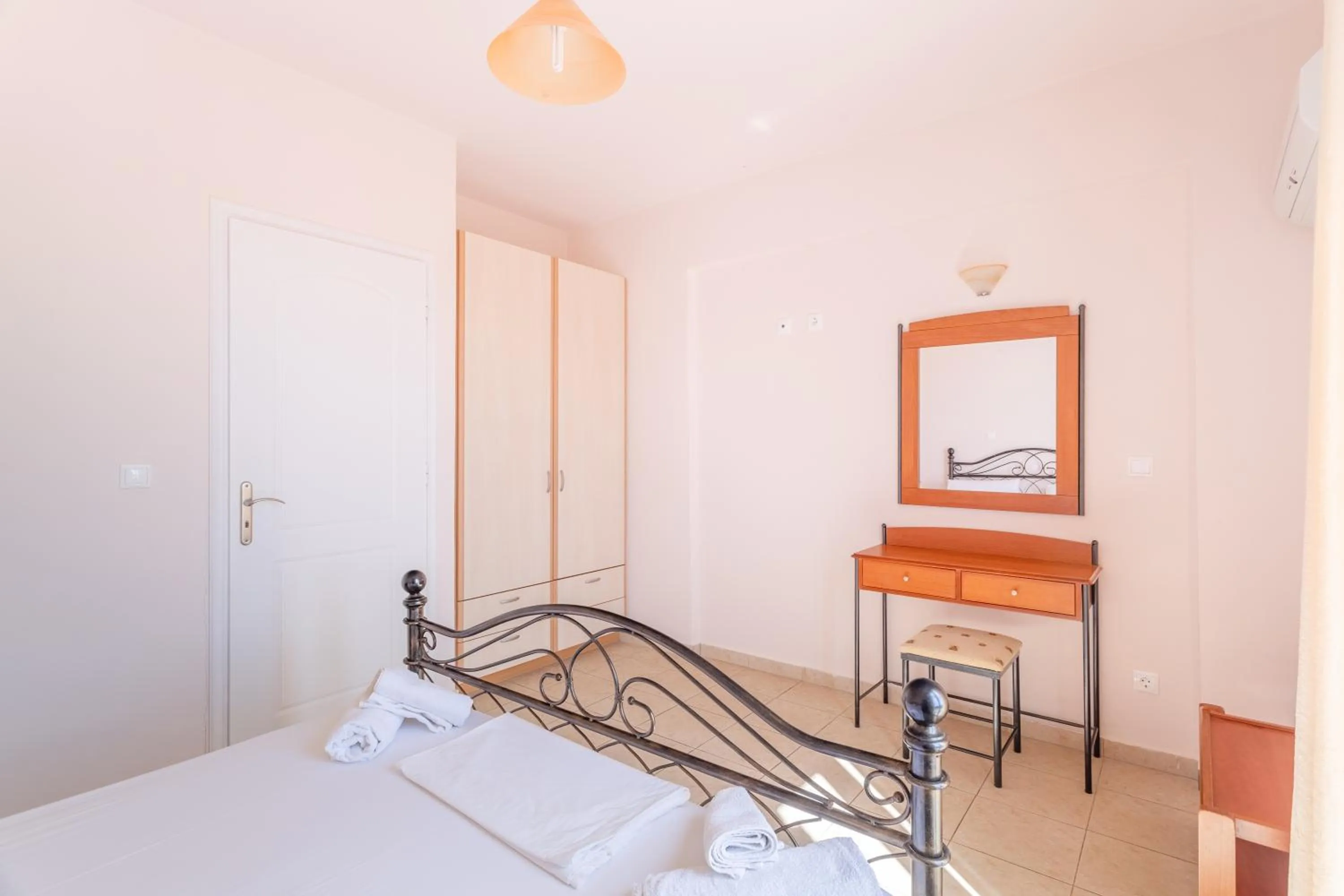 Bed in Hotel Aphrodite