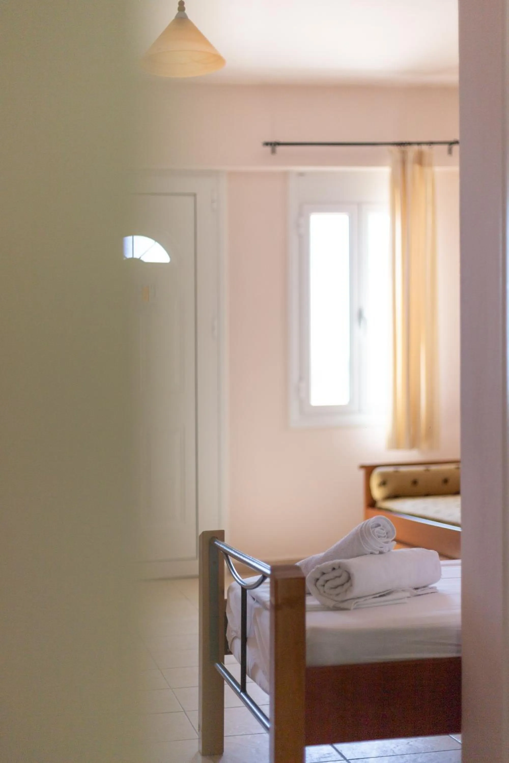 Bed in Hotel Aphrodite