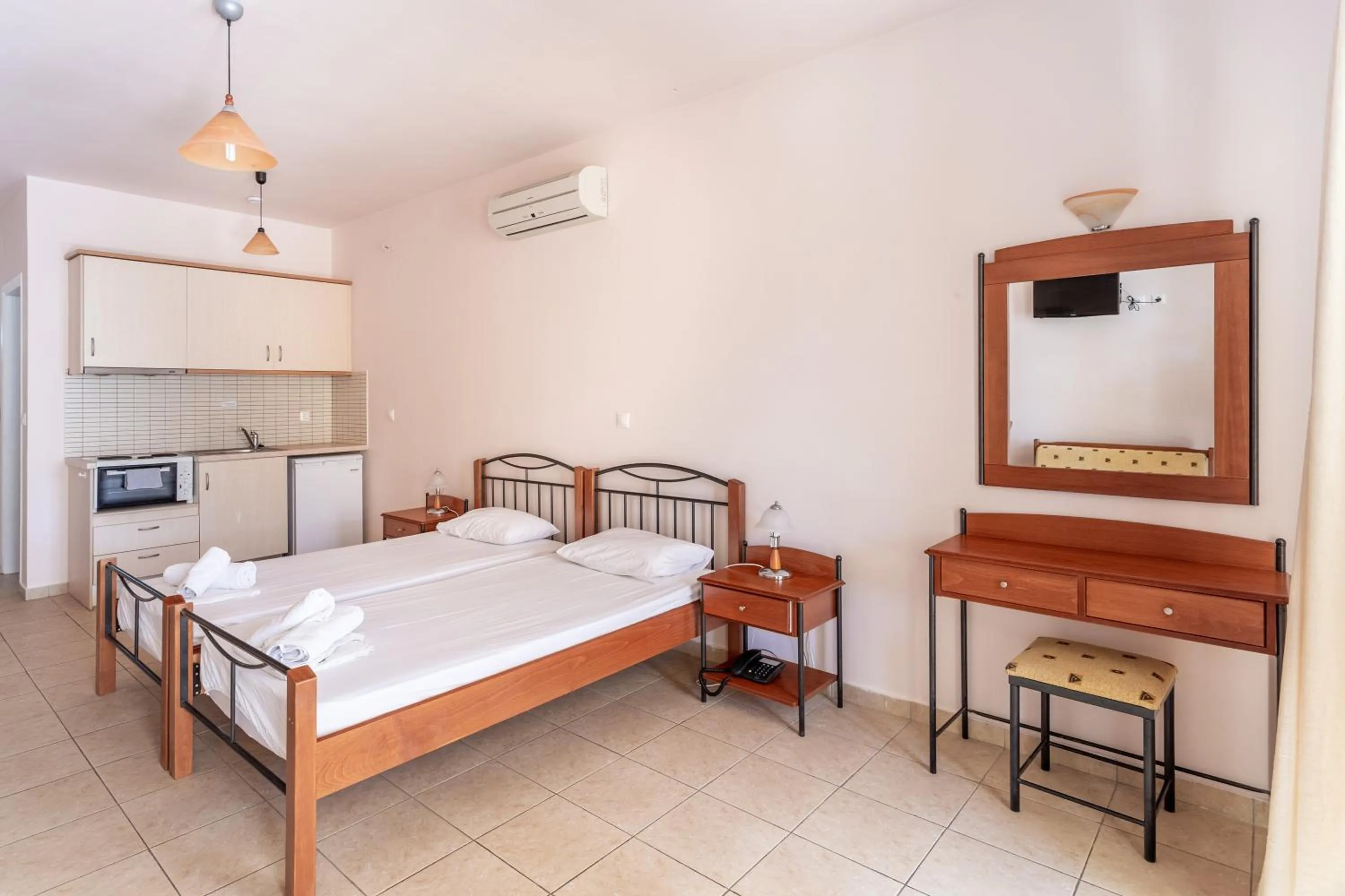 Bed in Hotel Aphrodite