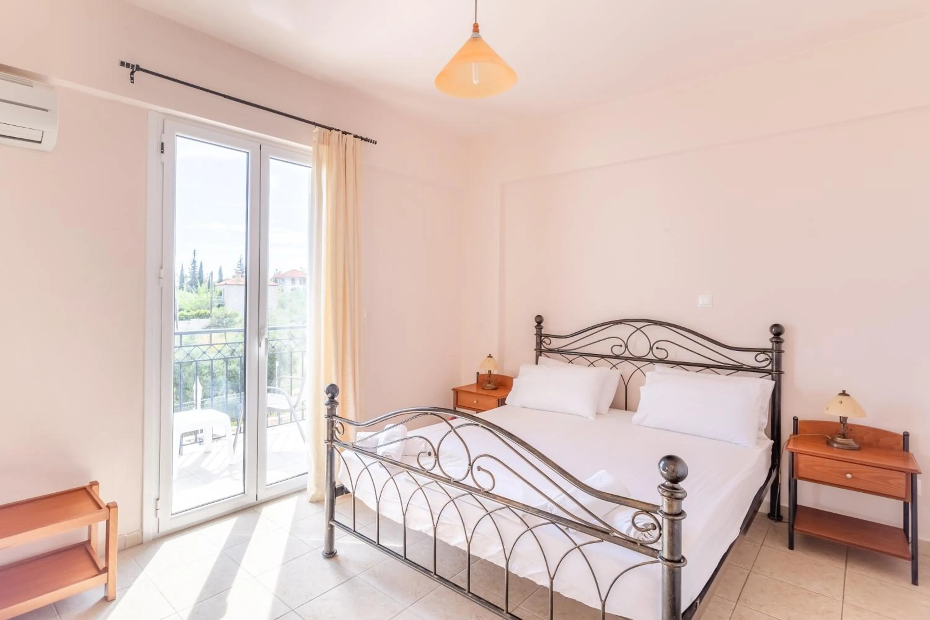 Bed in Hotel Aphrodite