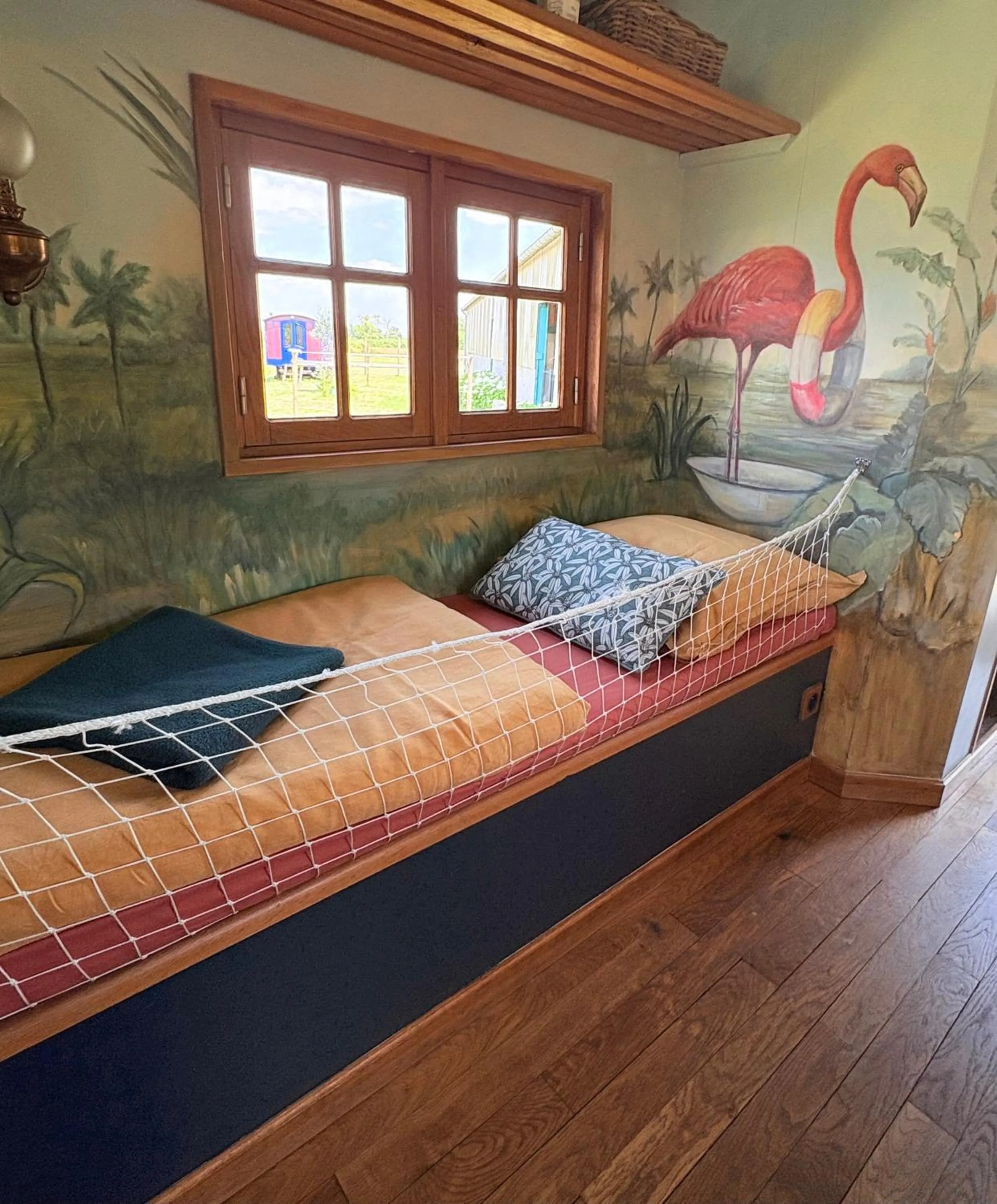 Bed in La roulotte Champêtre des Grillots