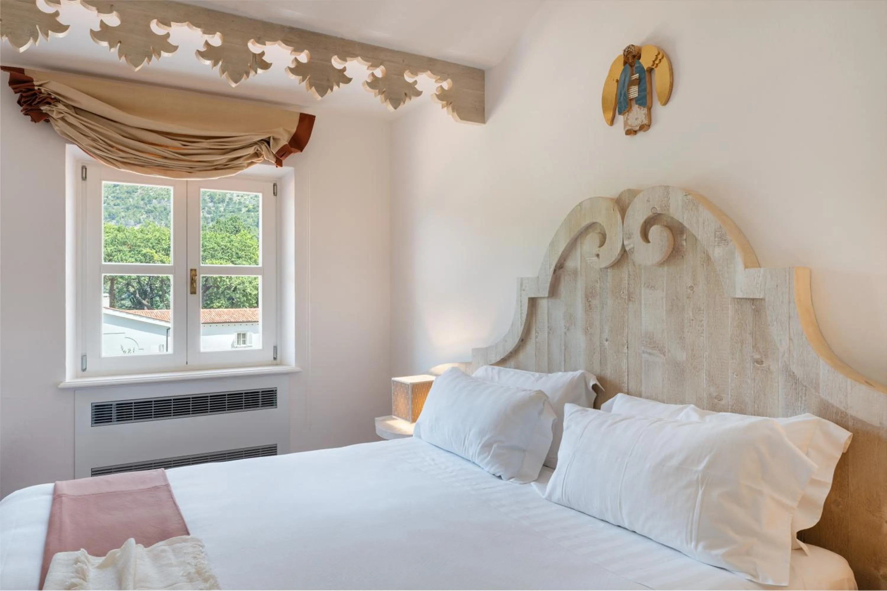 Bed in Santavenere Hotel