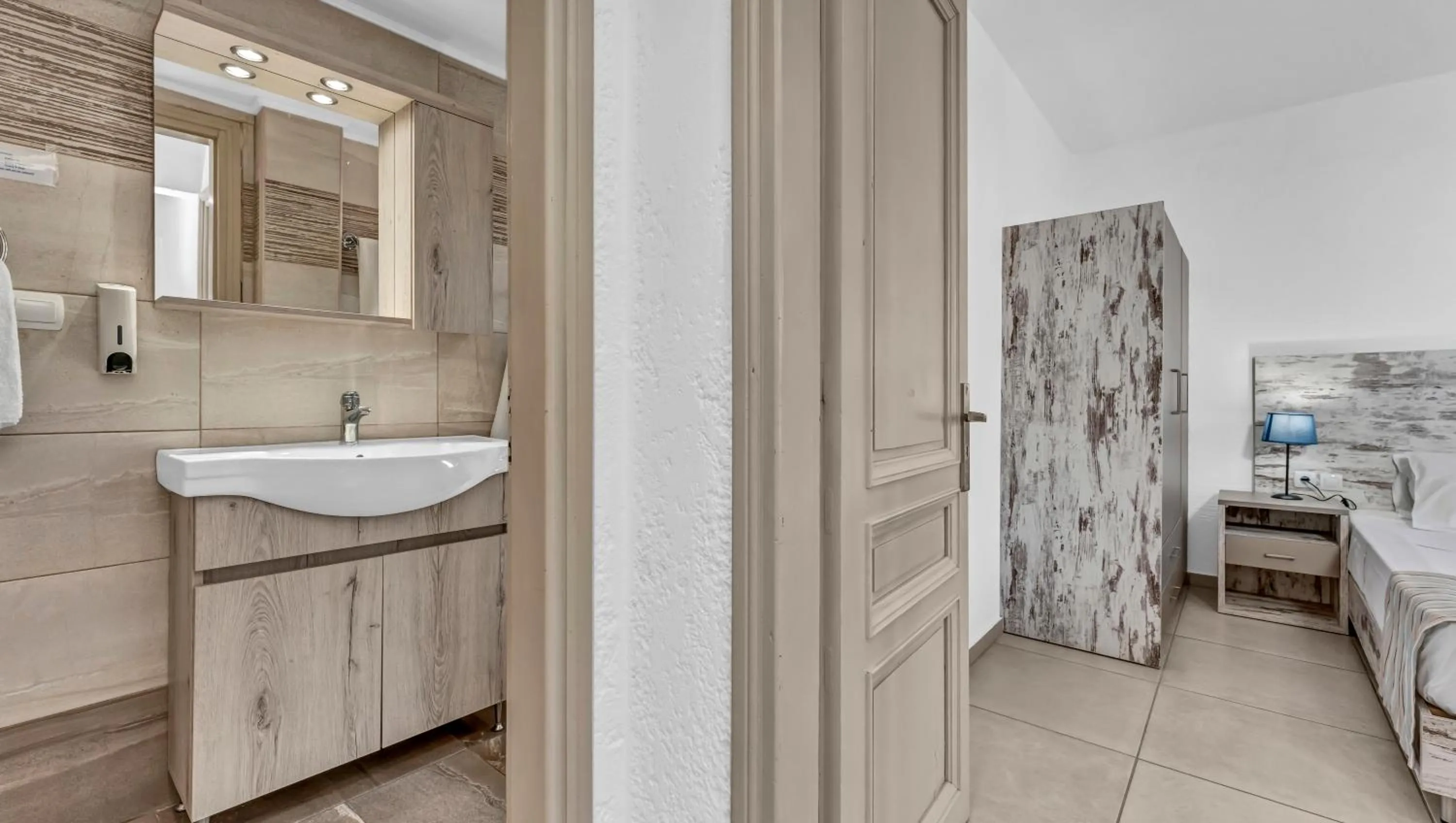 Bathroom in Evina Rooms & Suites