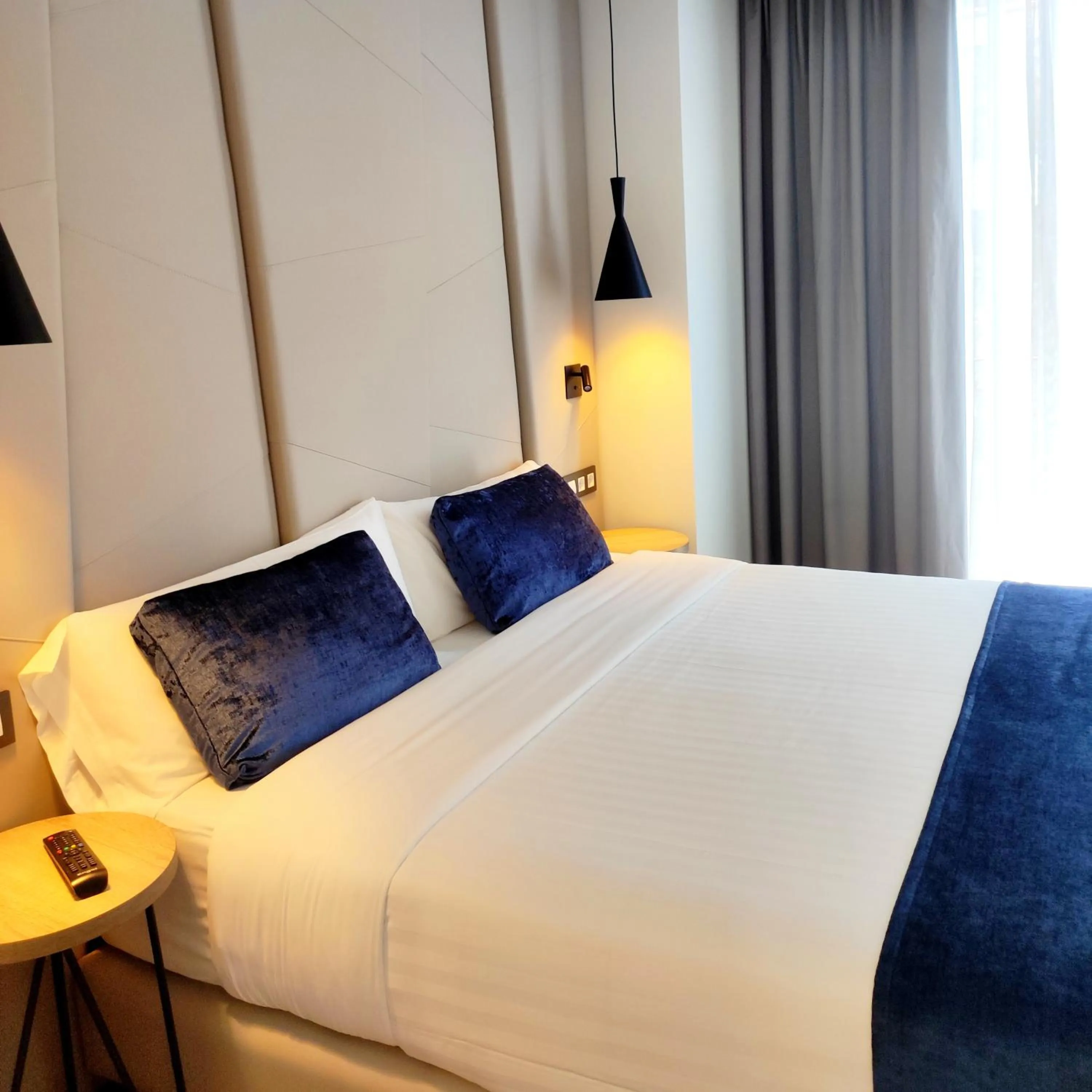 Bed in Taverna de la Sal Boutique Hotel