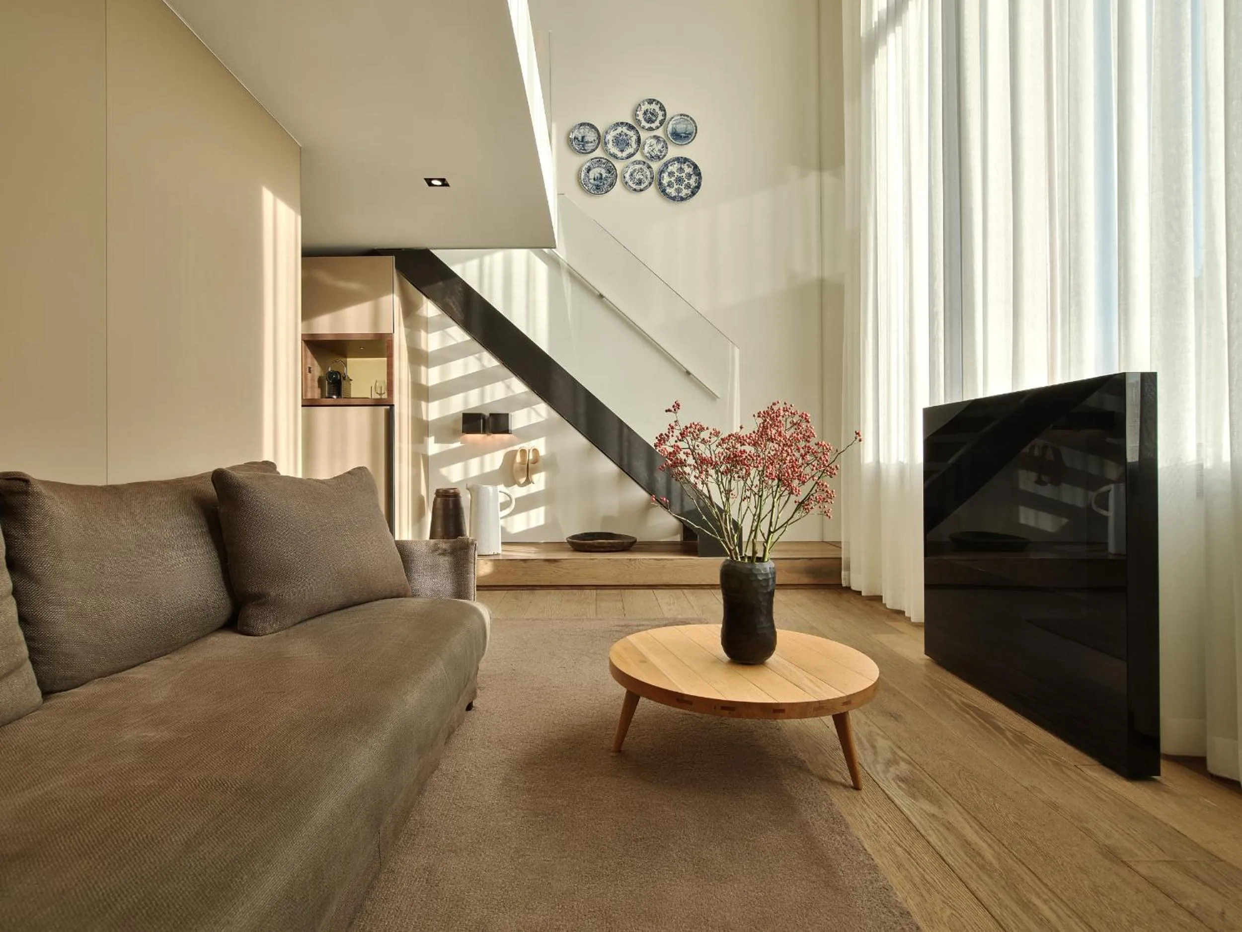 Living room in Conservatorium Hotel - Operated by Mandarin Oriental