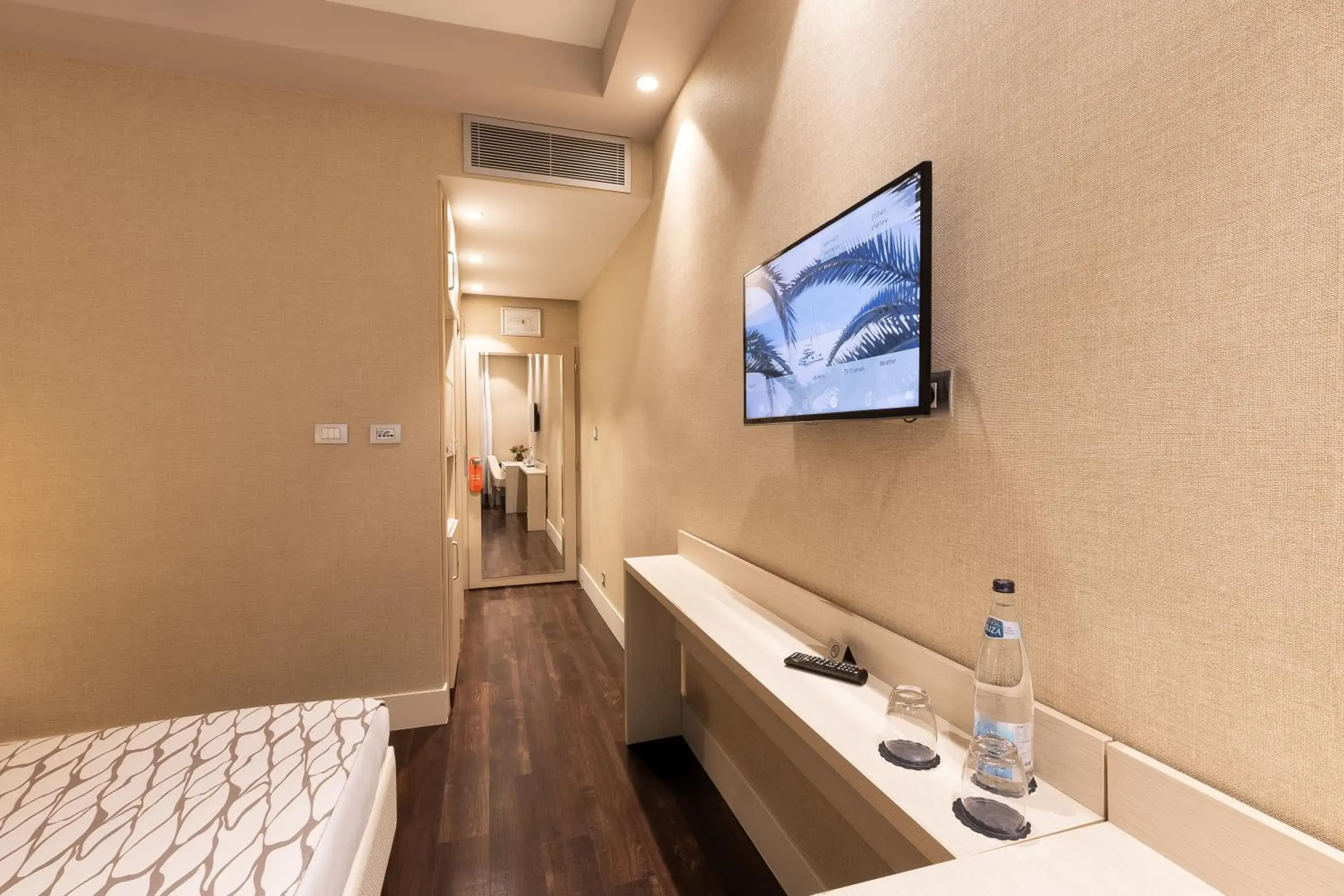 Communal lounge/ TV room, Bed in Hotel Palma Communal lounge/ TV room, Bed in Hotel Palma