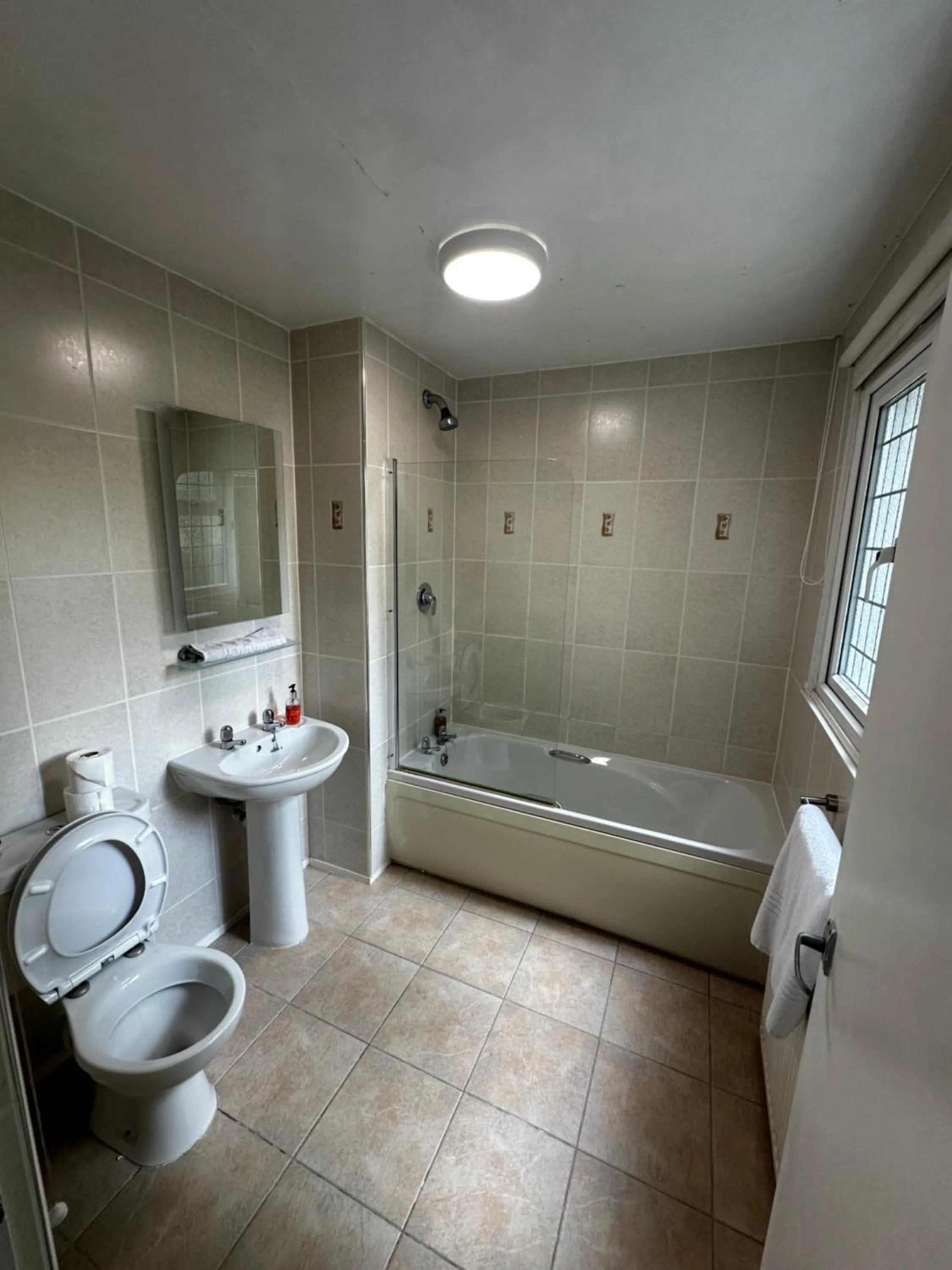 Shower in Barons Court Hotel