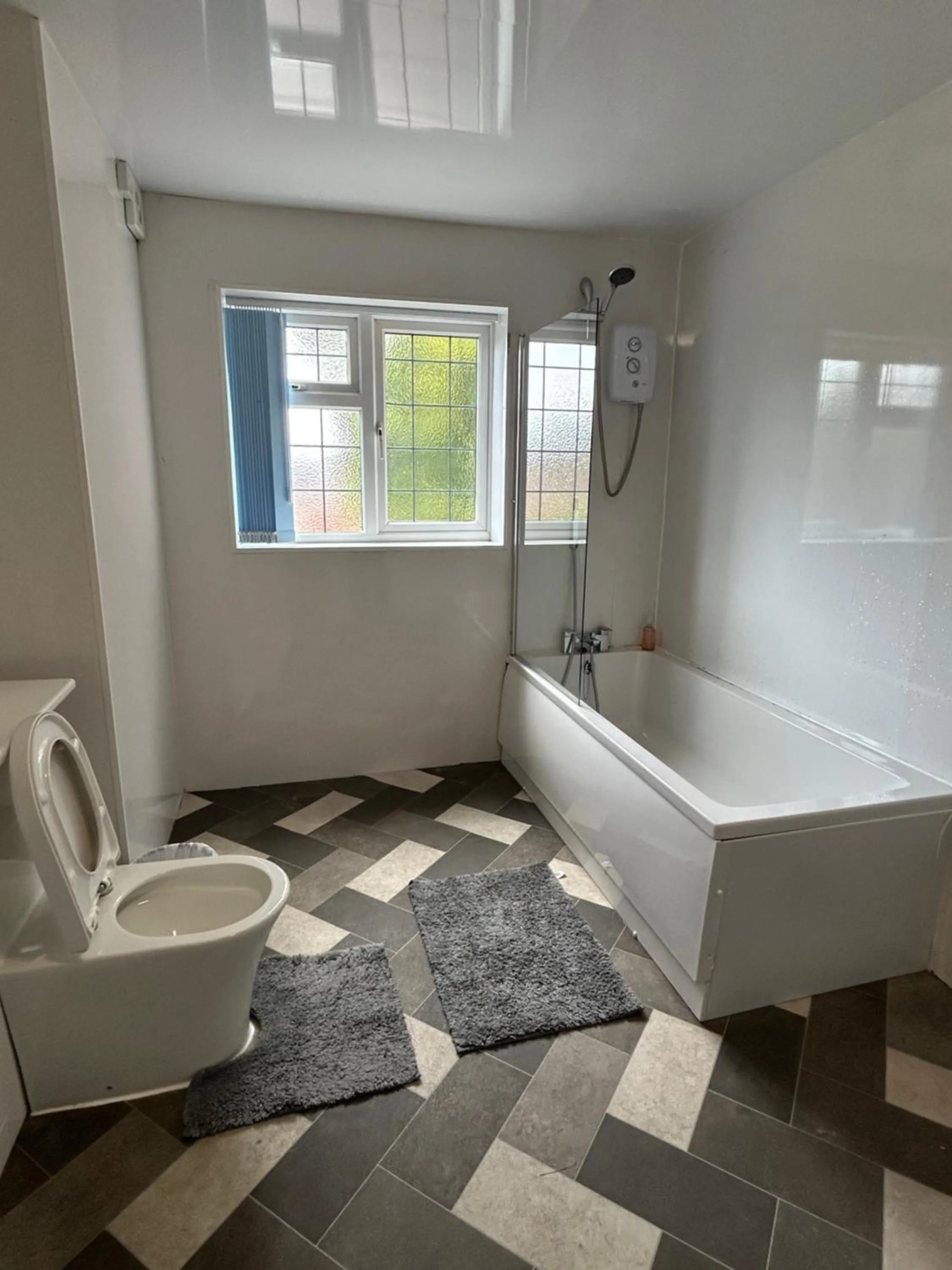 Shower in Barons Court Hotel