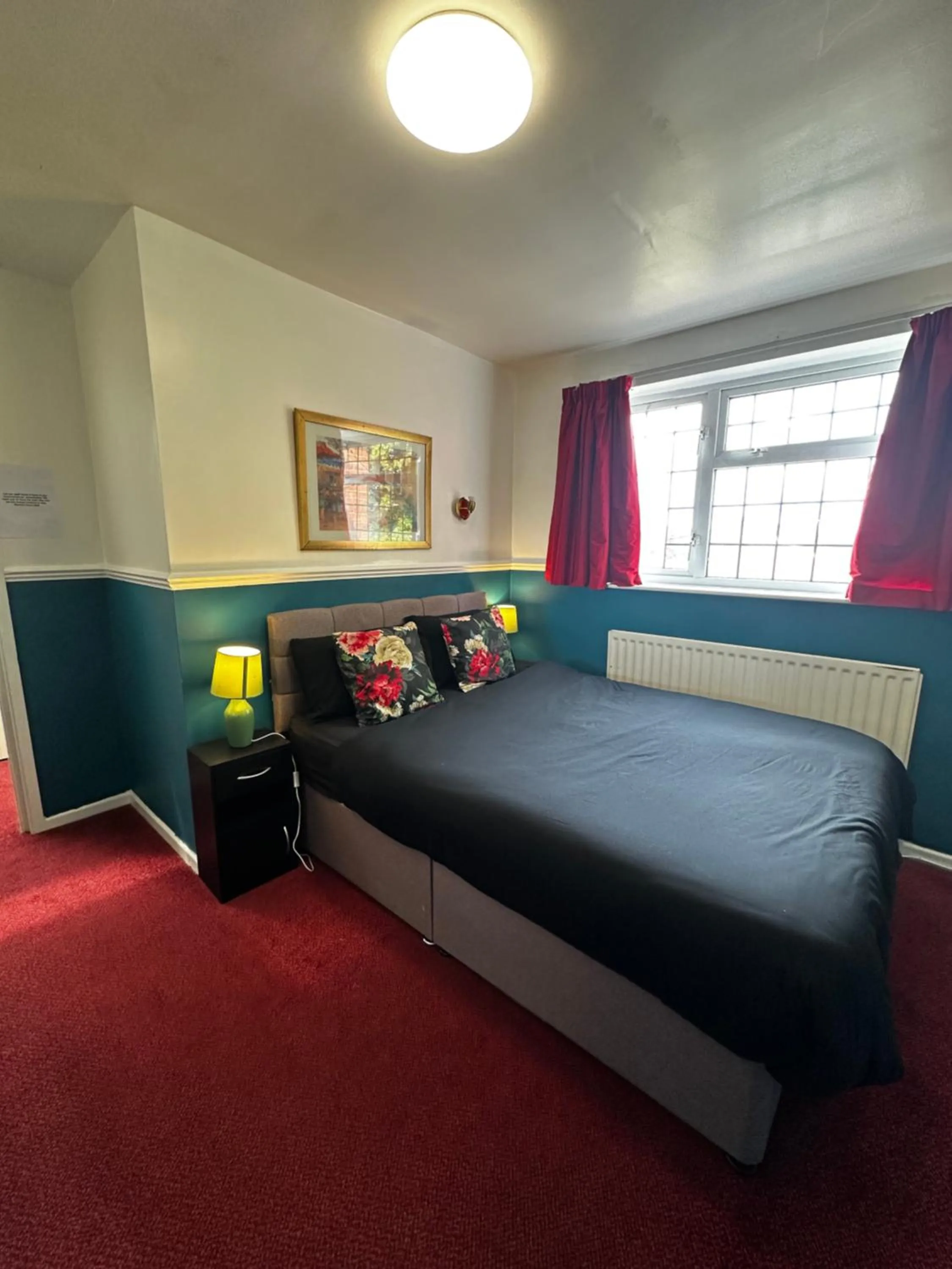 Bed in Barons Court Hotel