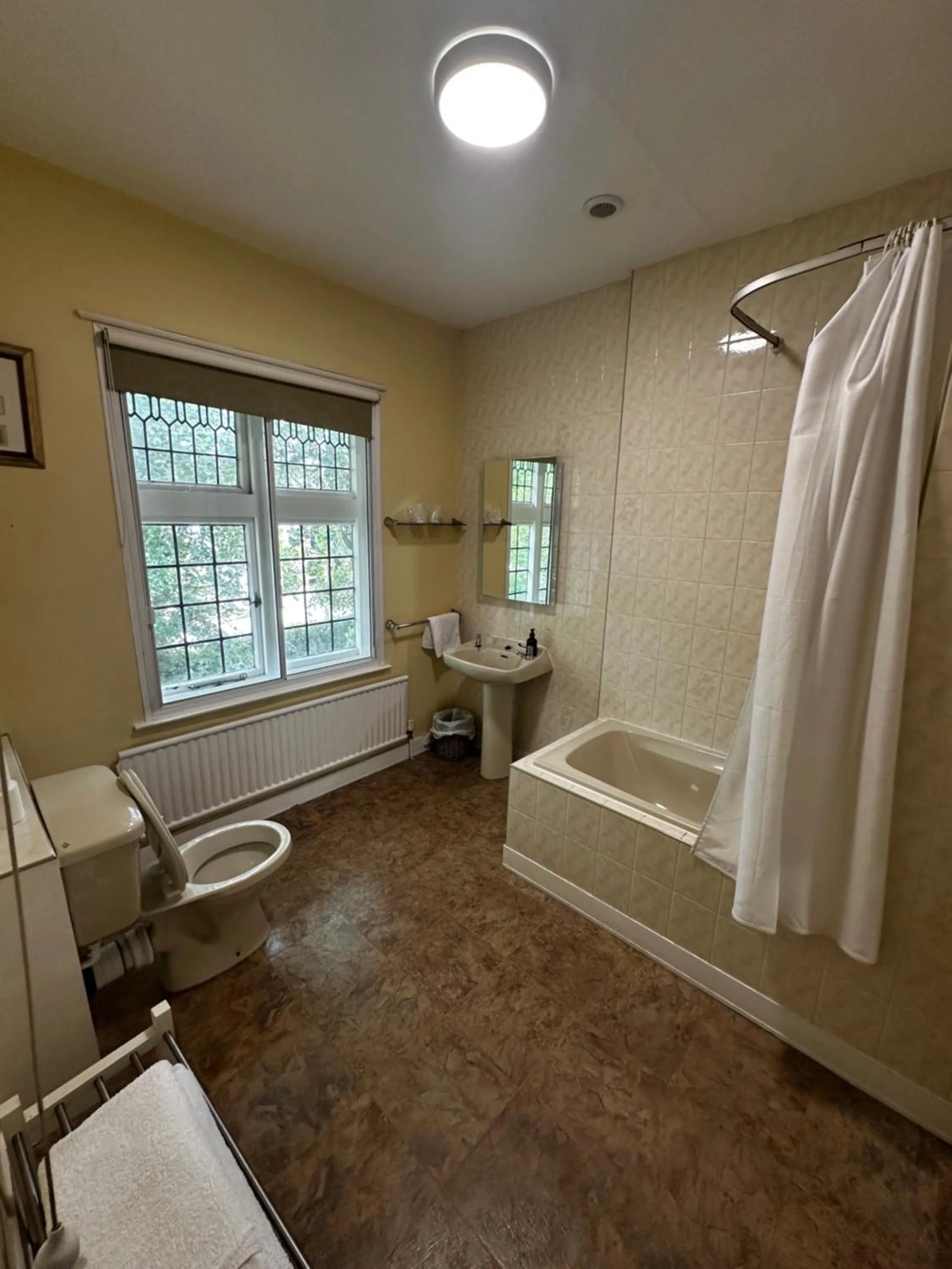 Shower in Barons Court Hotel