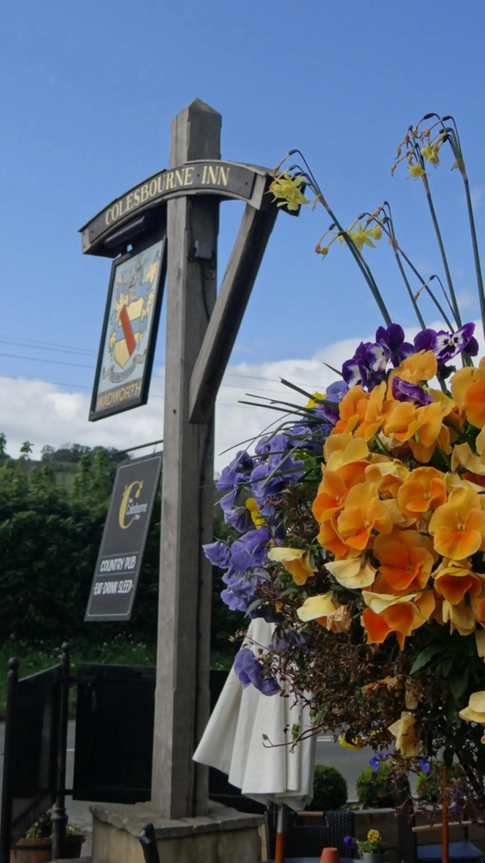 Property logo or sign in The Colesbourne Inn