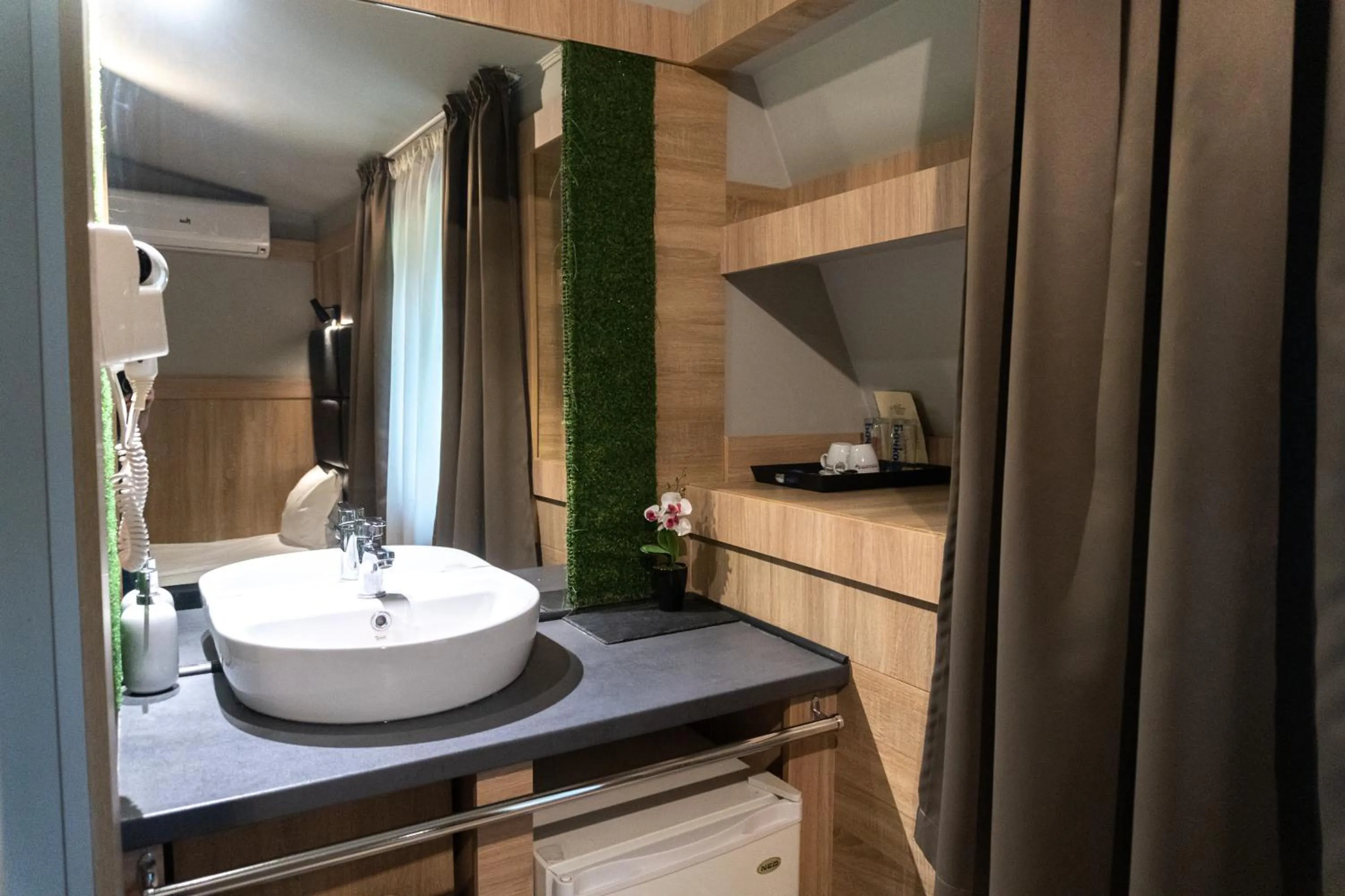 Bathroom in Hotel Allur