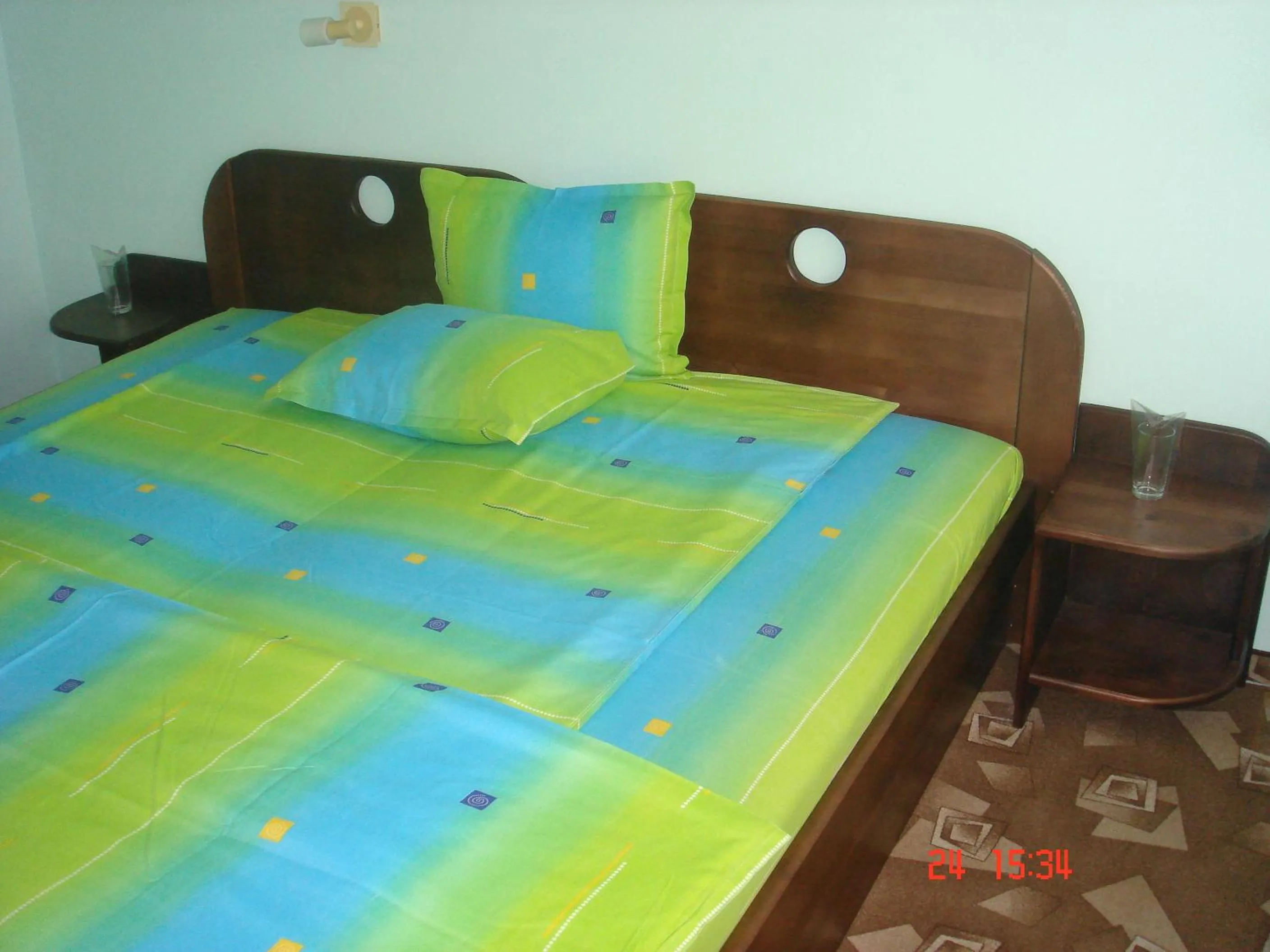 Bed in Family Hotel Iv
