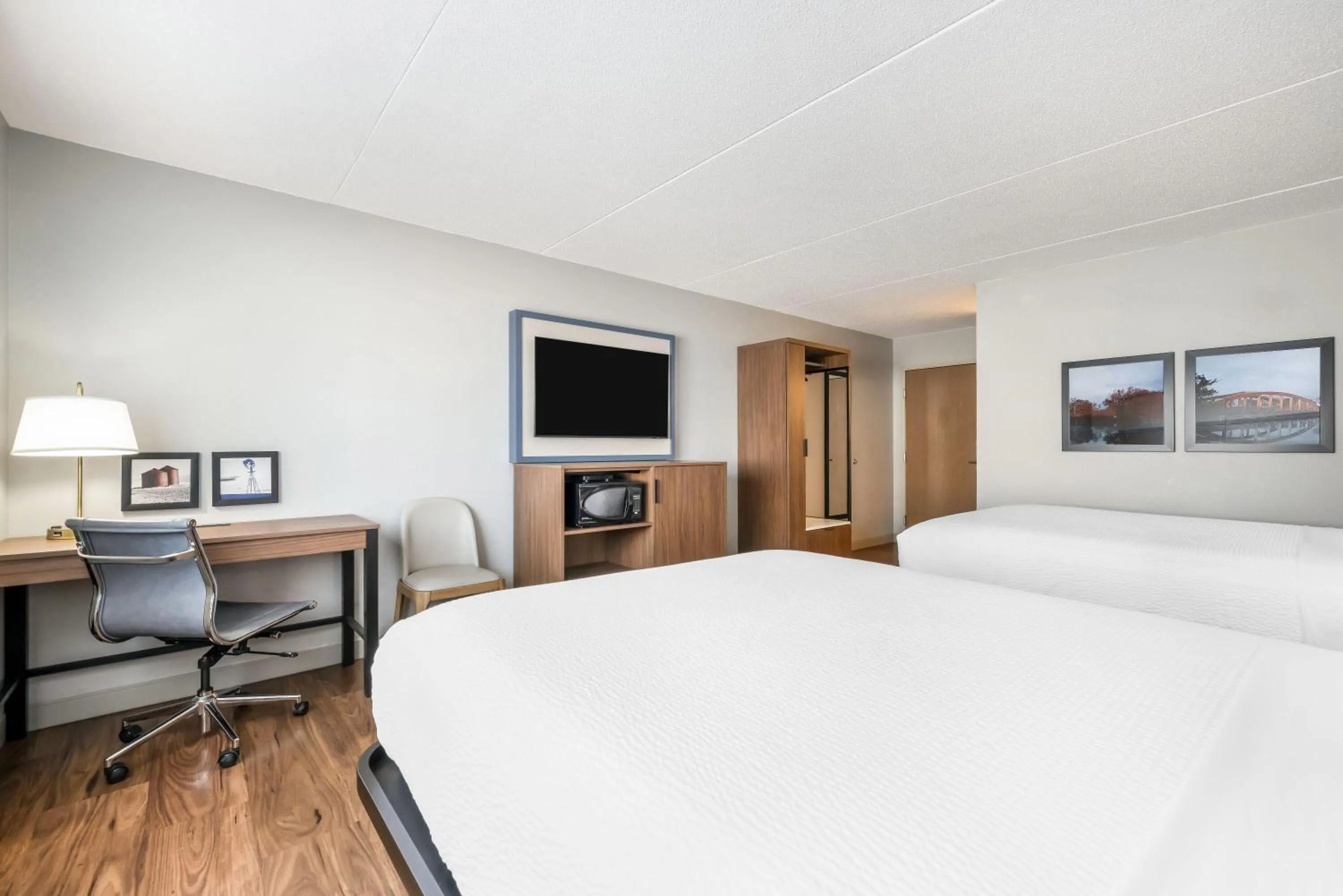 Bed in AmericInn by Wyndham Valley City Conference Center