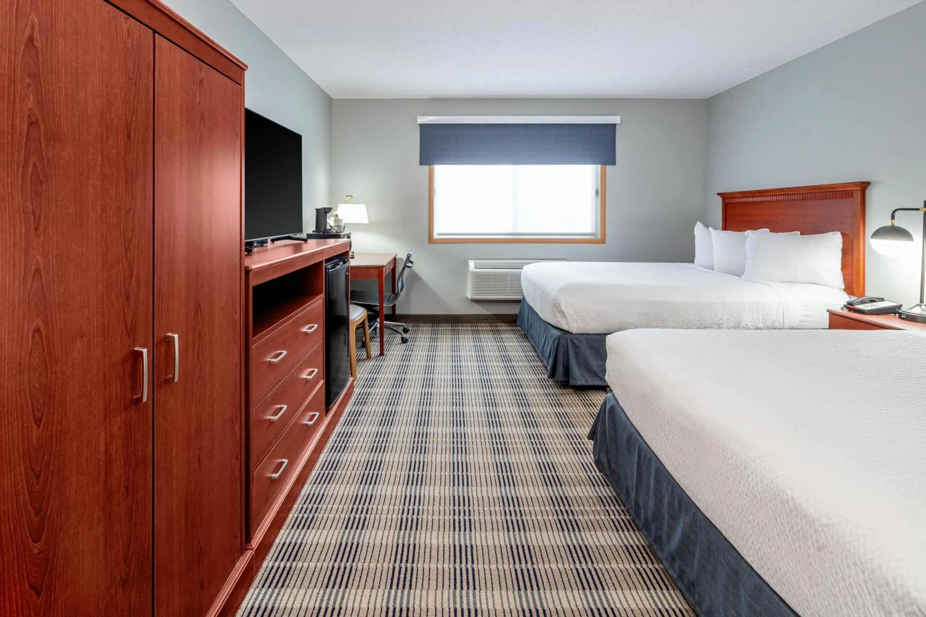 Photo of the whole room, Bed in AmericInn by Wyndham Valley City Conference Center