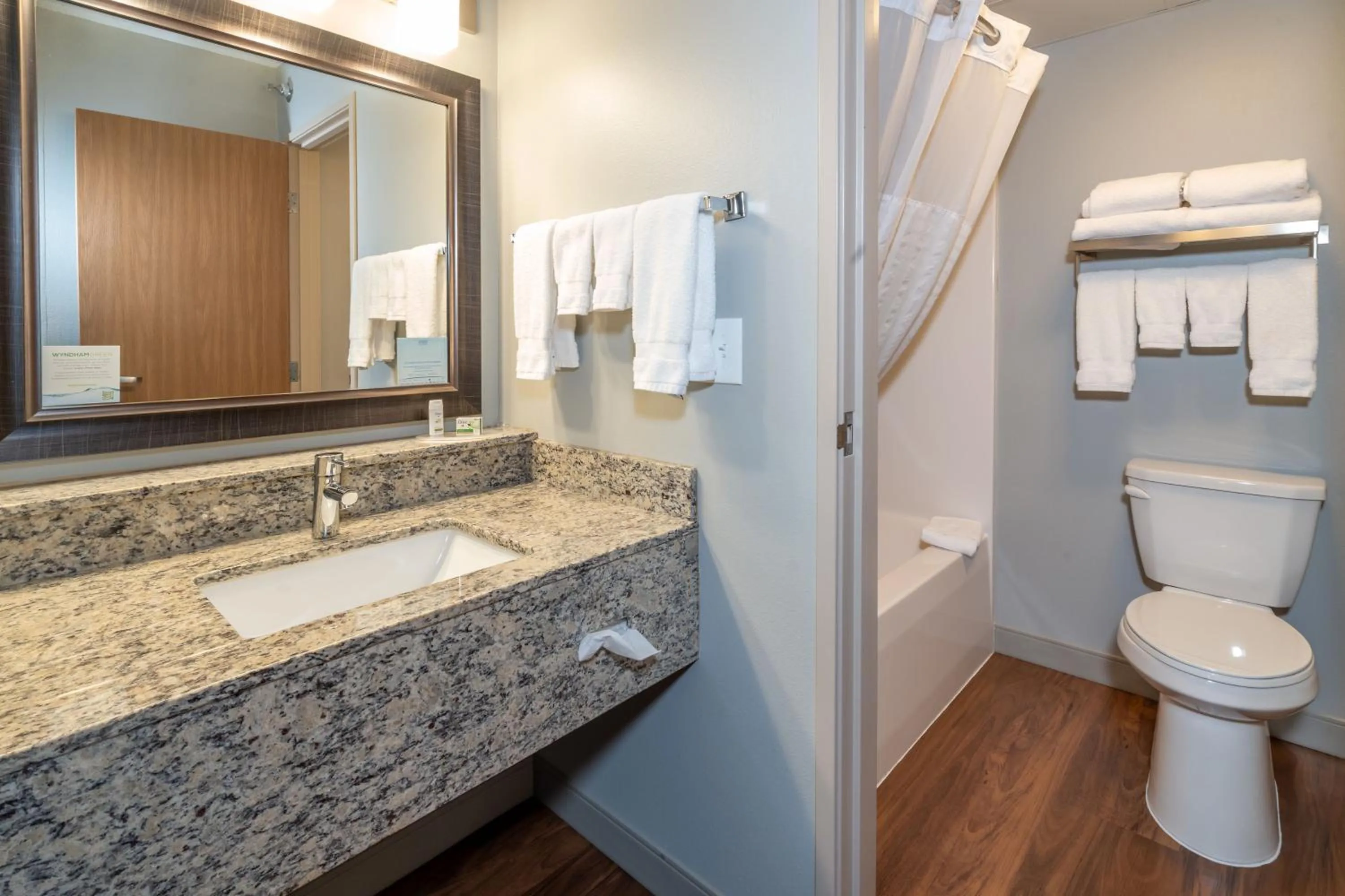 Bathroom in AmericInn by Wyndham Valley City Conference Center