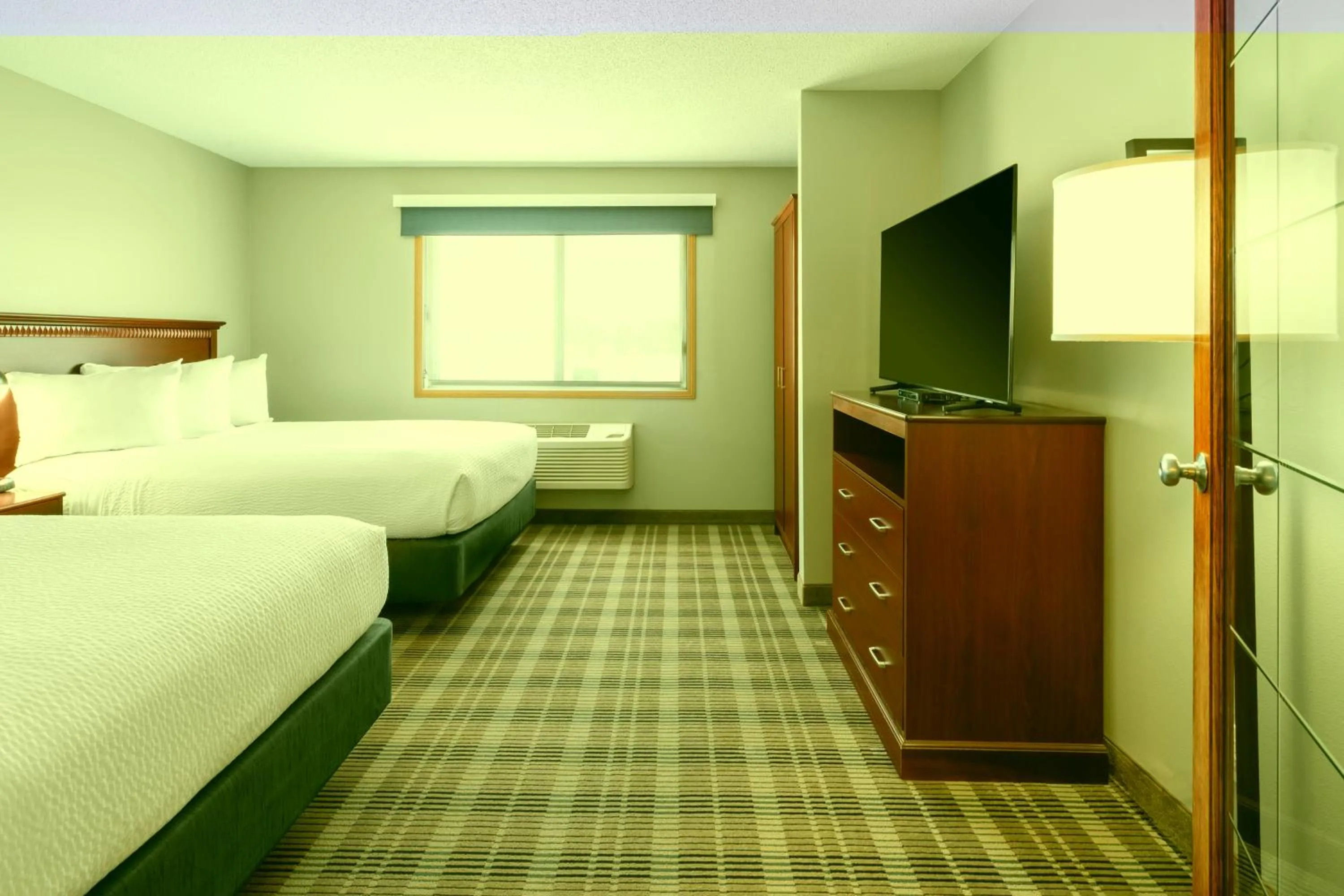 Photo of the whole room, Bed in AmericInn by Wyndham Valley City Conference Center