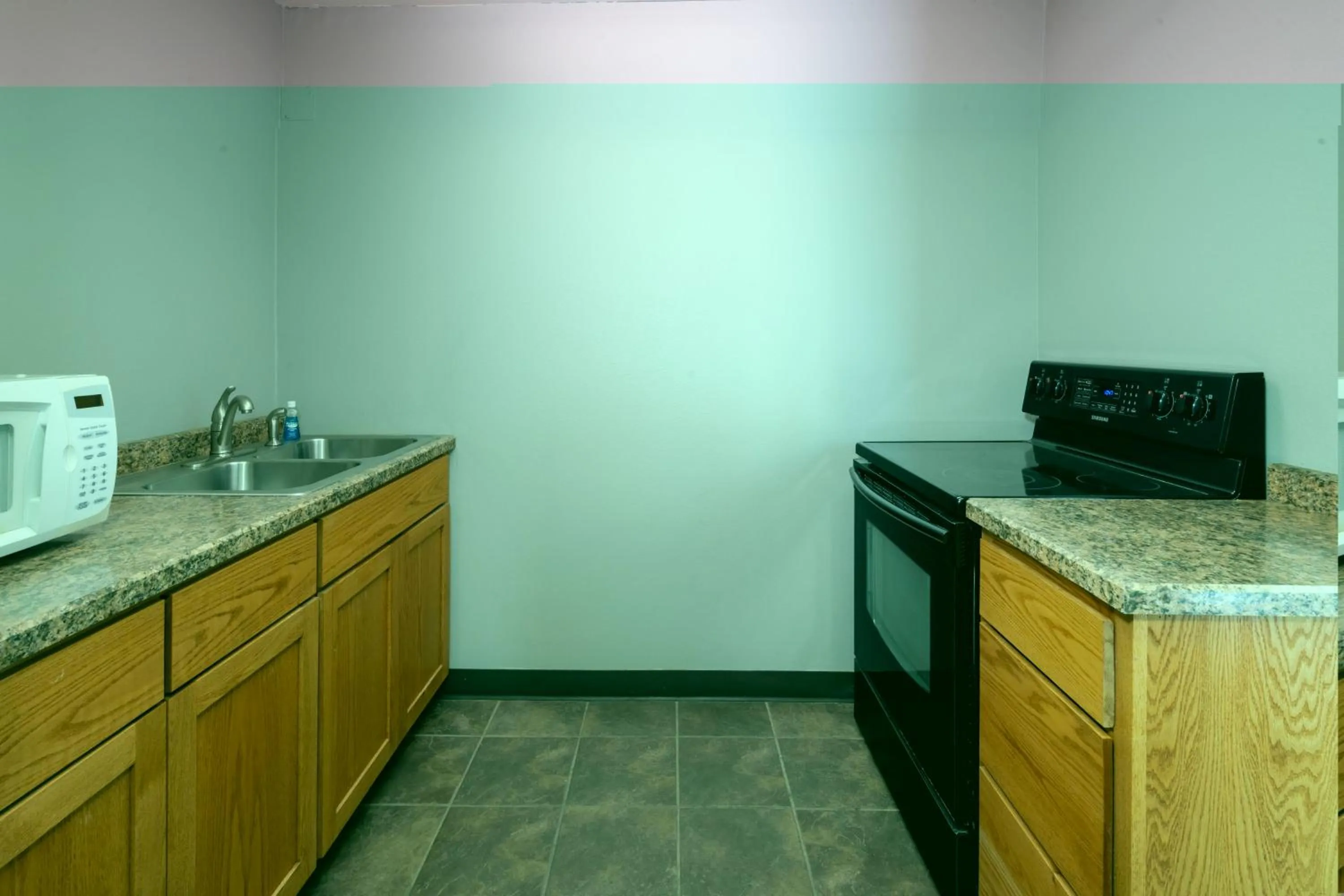 Communal kitchen in AmericInn by Wyndham Valley City Conference Center