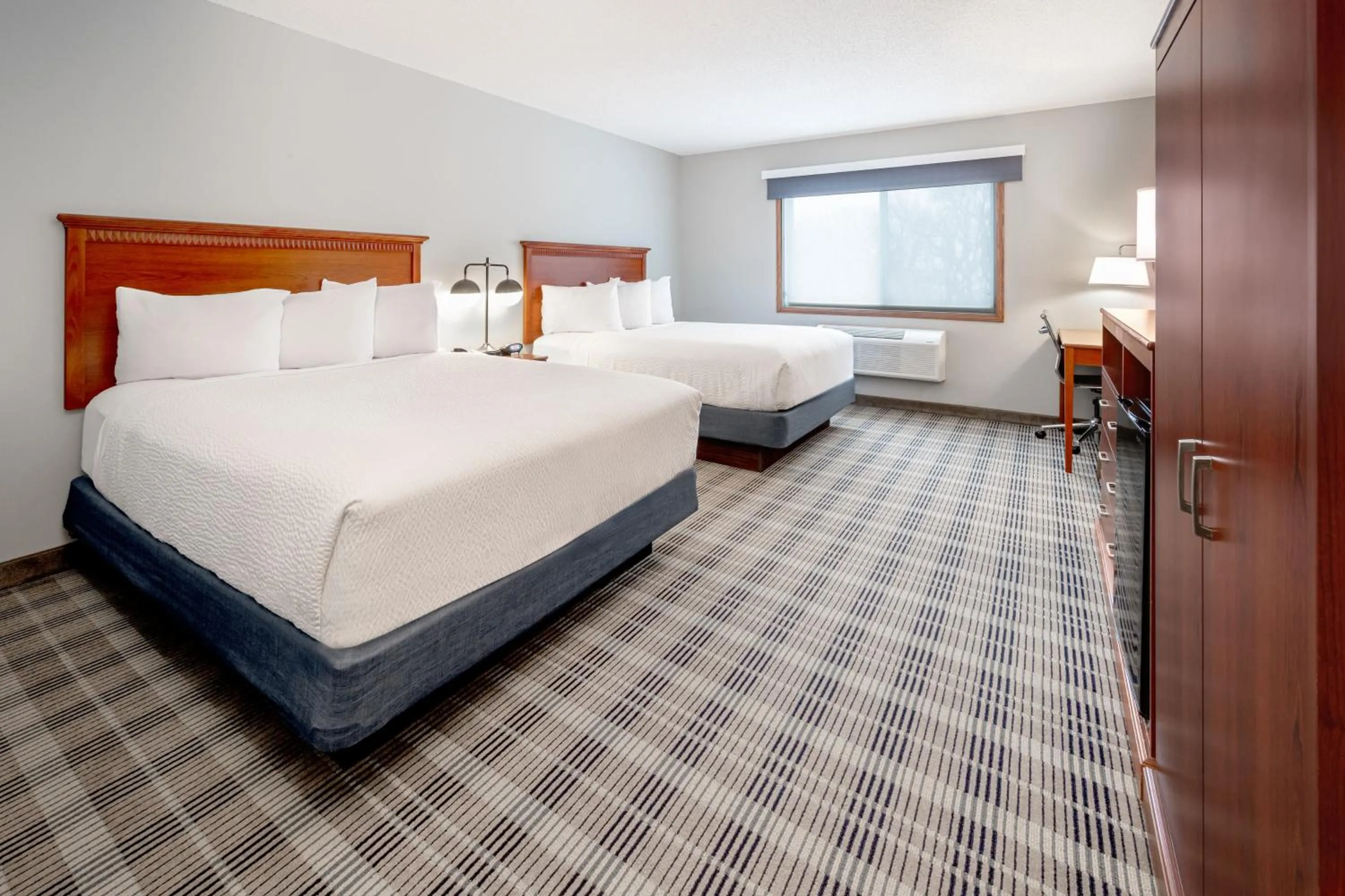 Photo of the whole room, Bed in AmericInn by Wyndham Valley City Conference Center