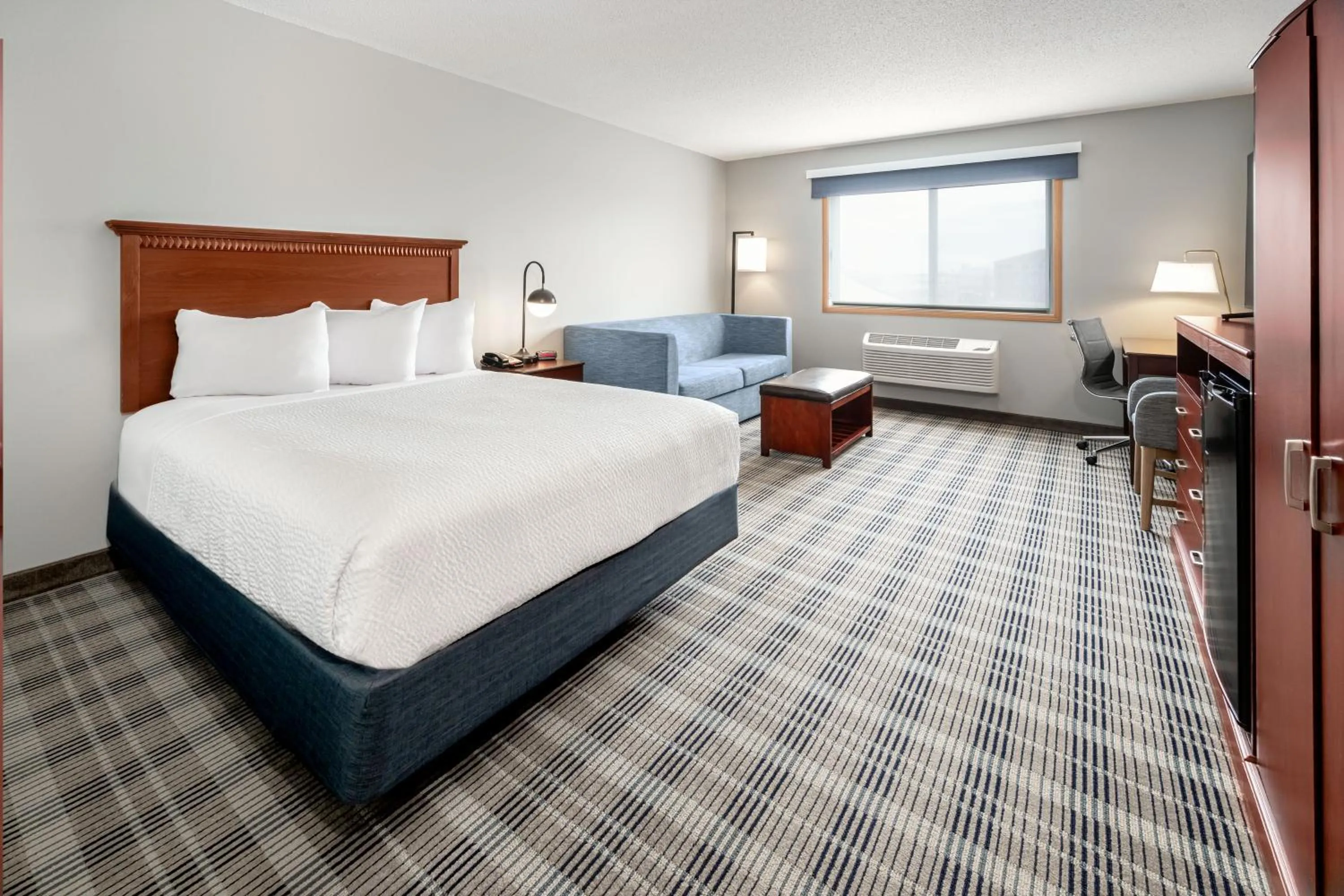 Photo of the whole room, Bed in AmericInn by Wyndham Valley City Conference Center