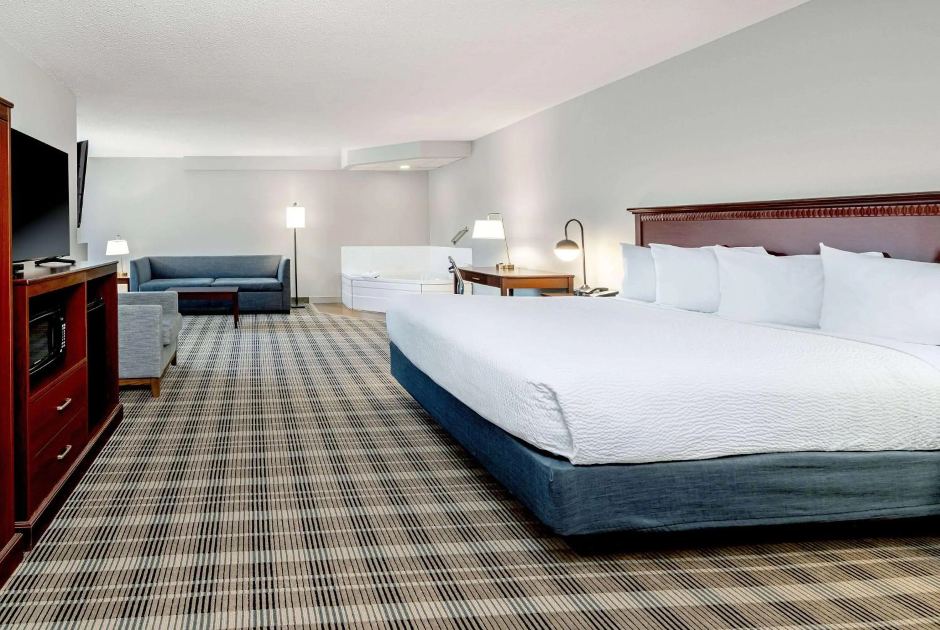 Photo of the whole room, Bed in AmericInn by Wyndham Valley City Conference Center