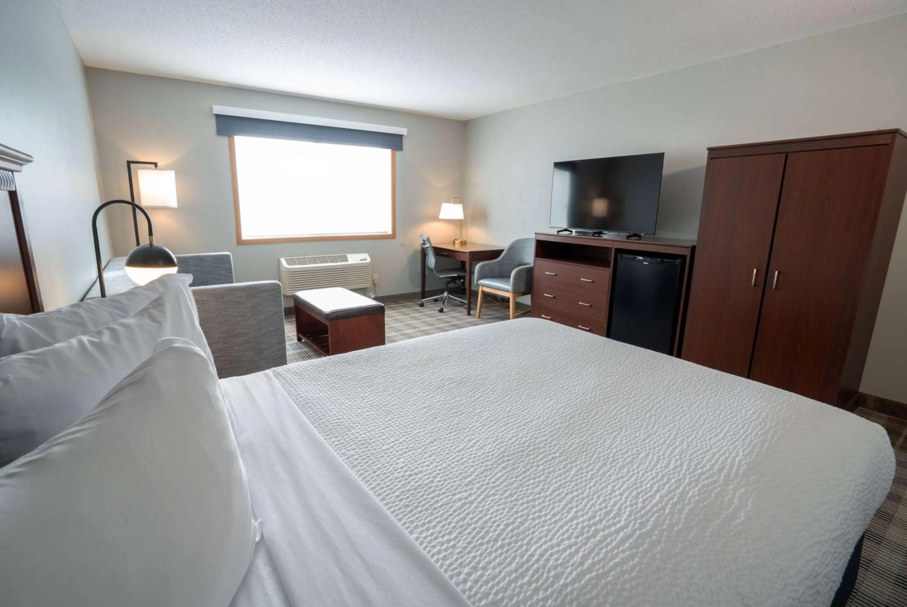 Photo of the whole room, Bed in AmericInn by Wyndham Valley City Conference Center