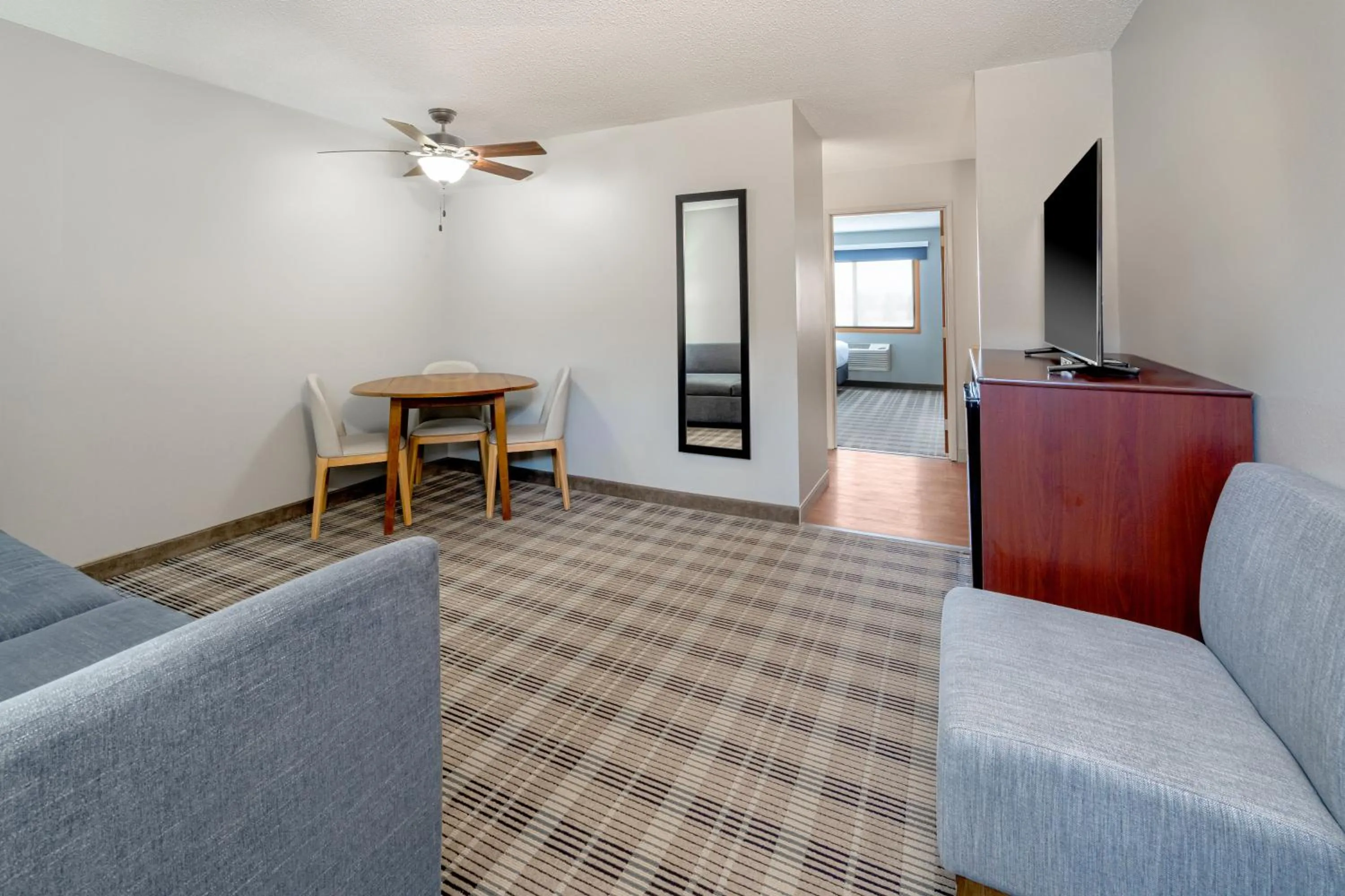 Living room in AmericInn by Wyndham Valley City Conference Center