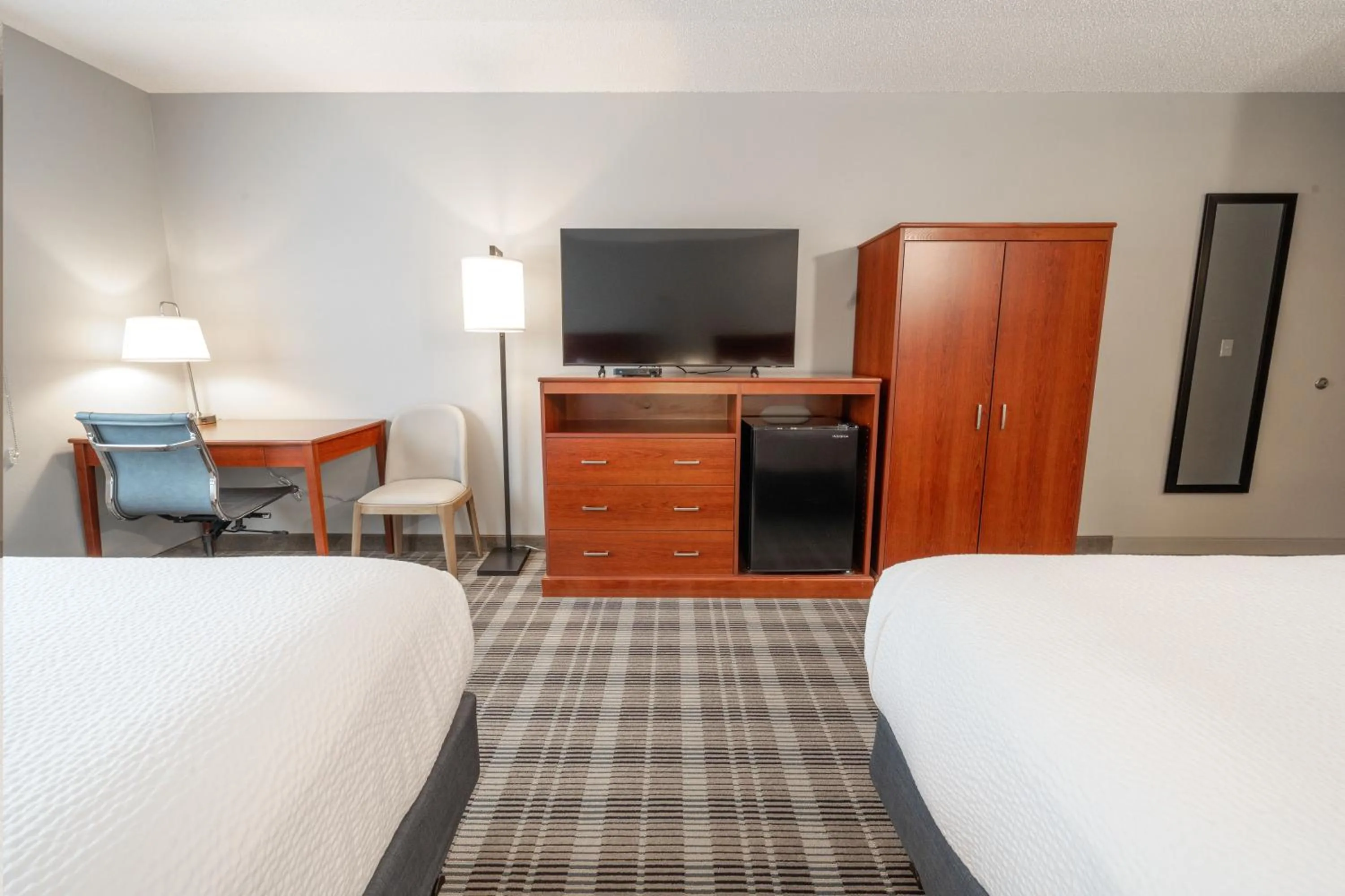 Photo of the whole room, Bed in AmericInn by Wyndham Valley City Conference Center