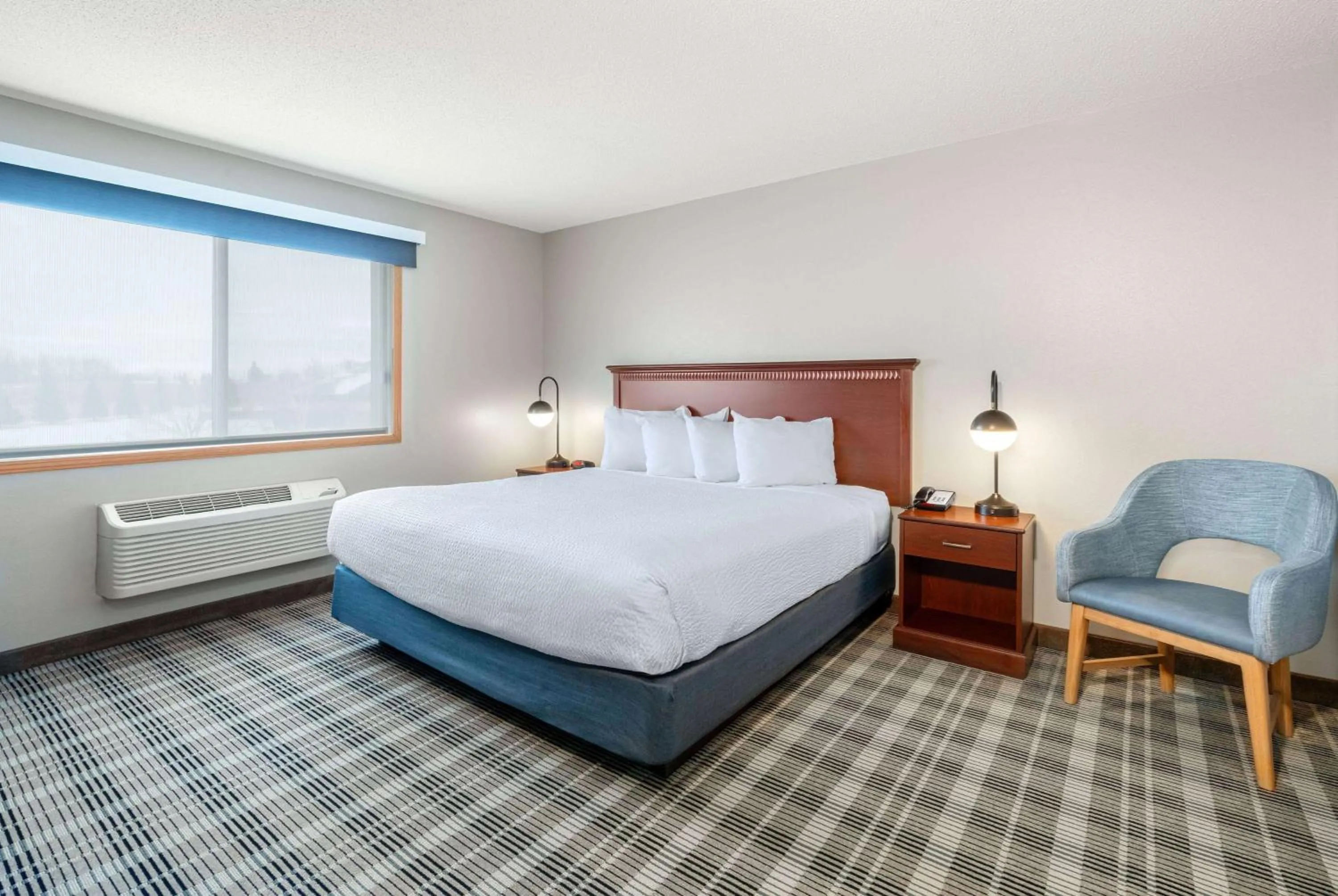Photo of the whole room, Bed in AmericInn by Wyndham Valley City Conference Center