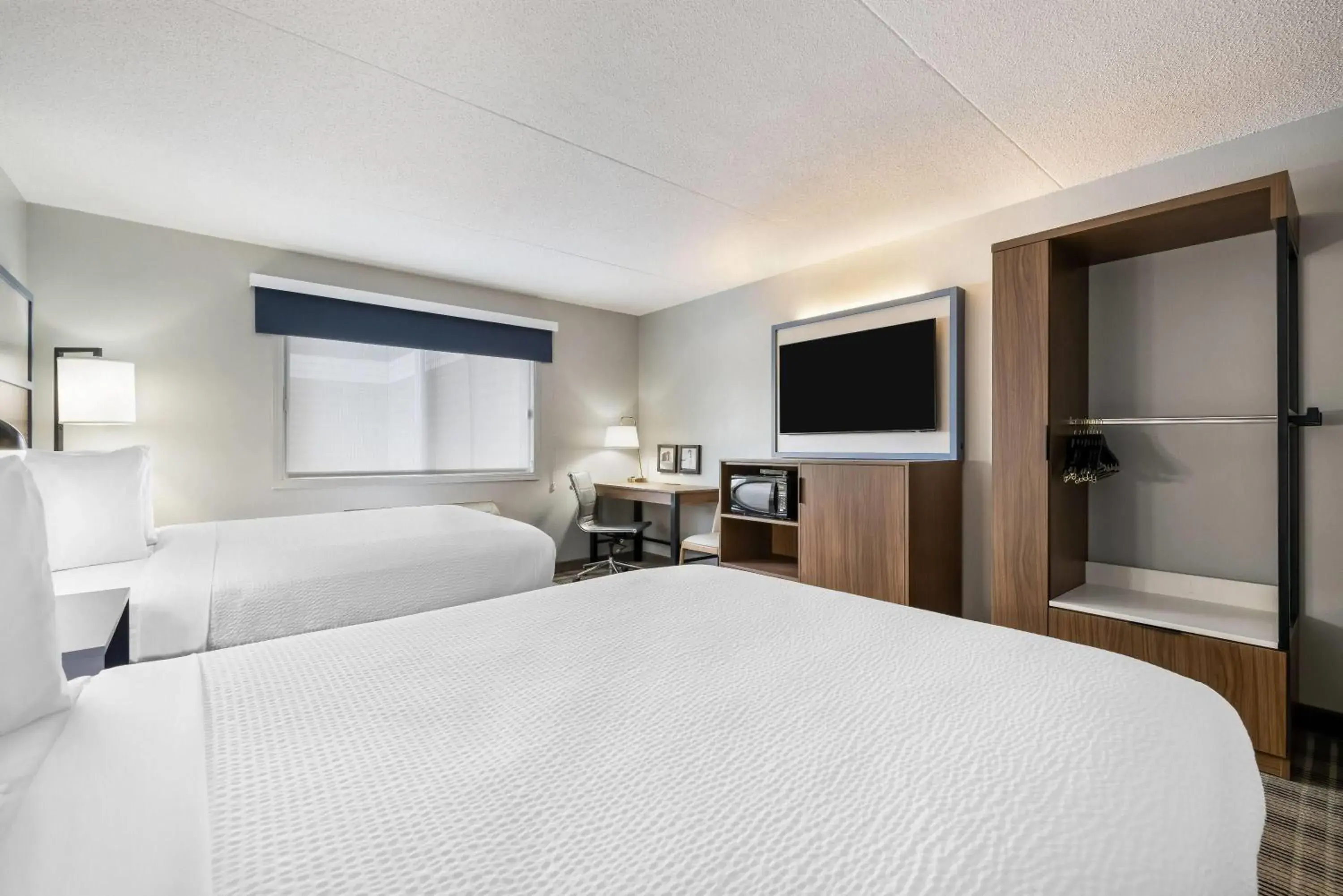 Bed in AmericInn by Wyndham Valley City Conference Center Bed in AmericInn by Wyndham Valley City Conference Center