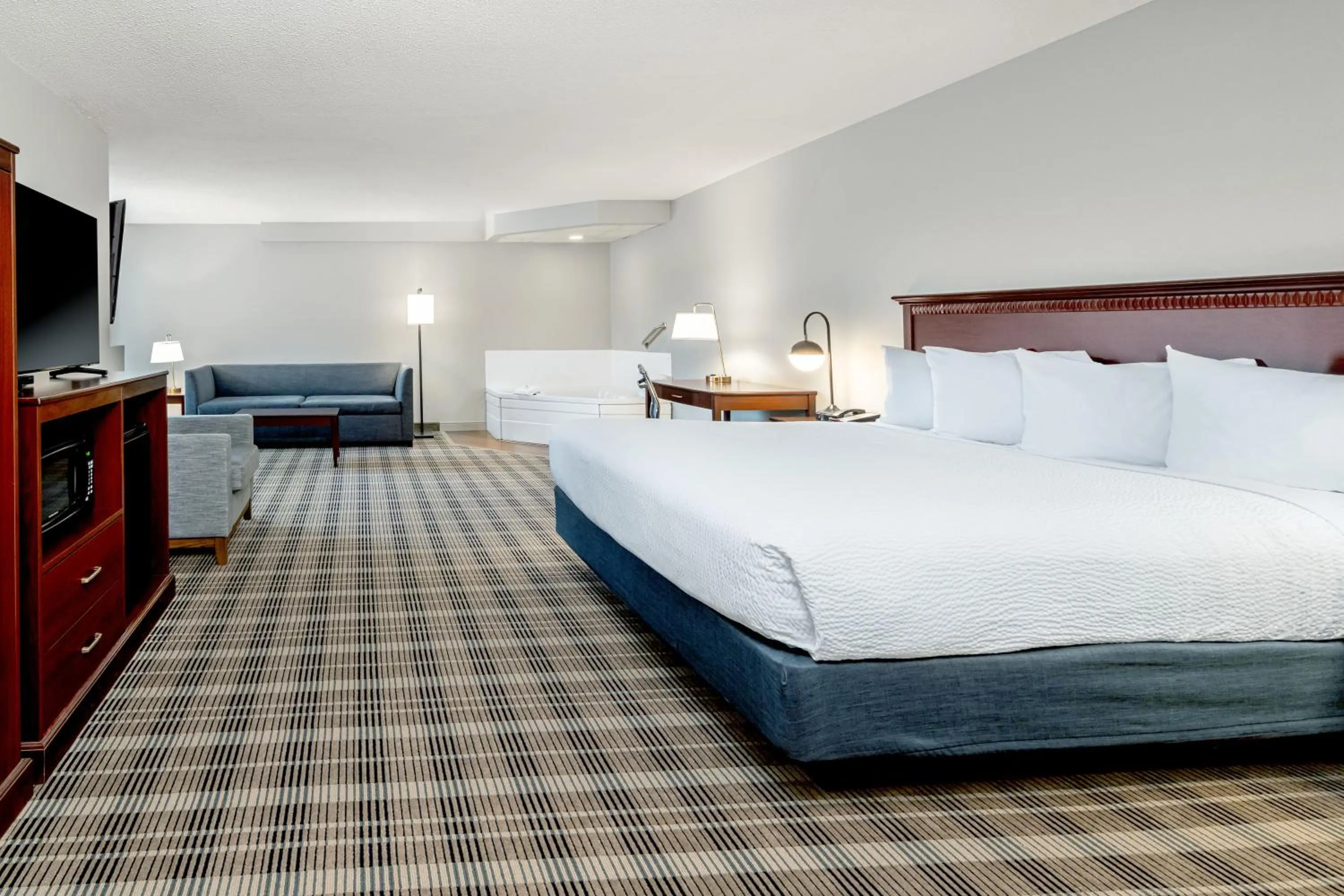 Photo of the whole room, Bed in AmericInn by Wyndham Valley City Conference Center