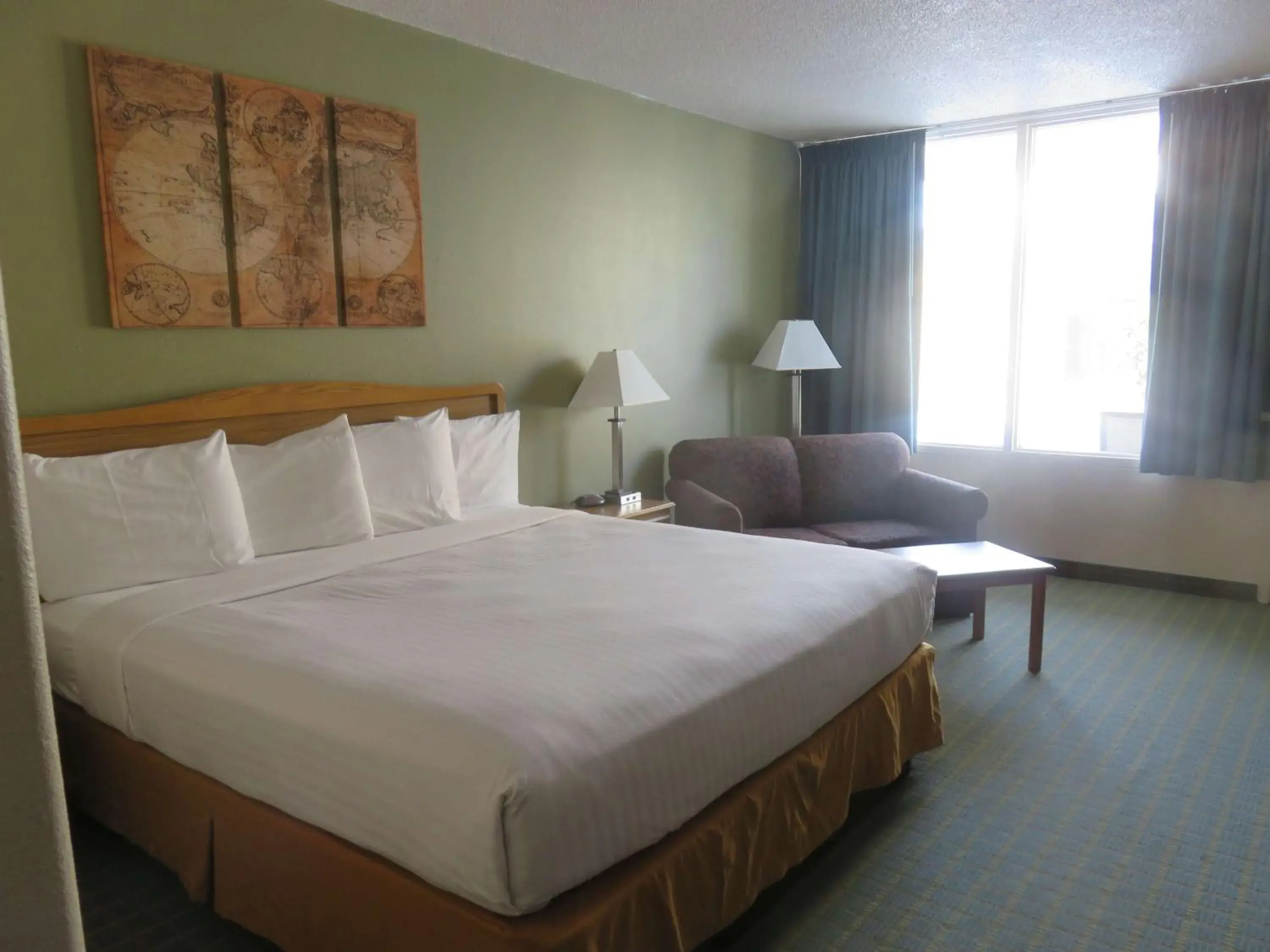 Photo of the whole room, Bed in Baymont by Wyndham Fargo