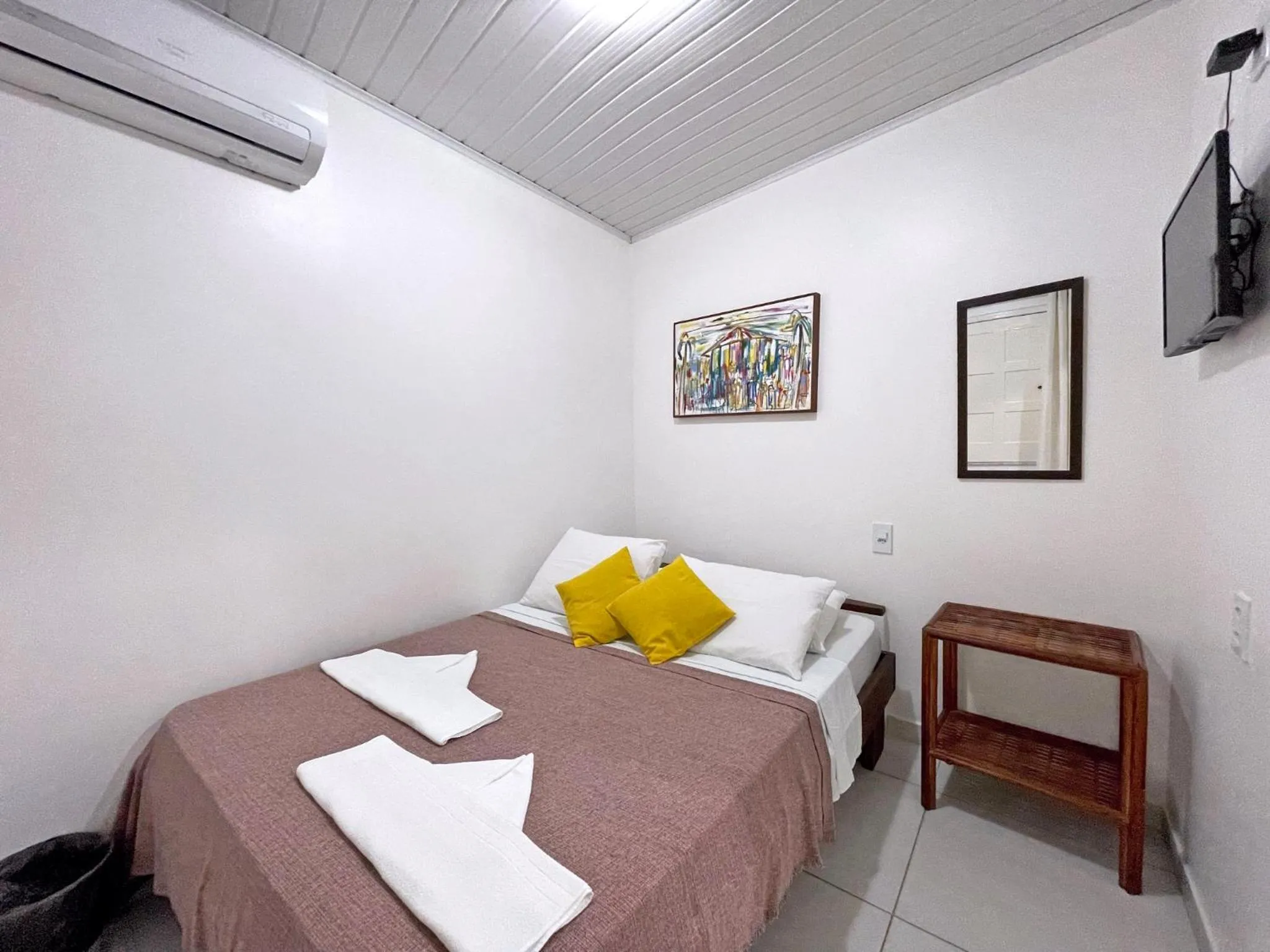 Bed in Pousada Aconchego