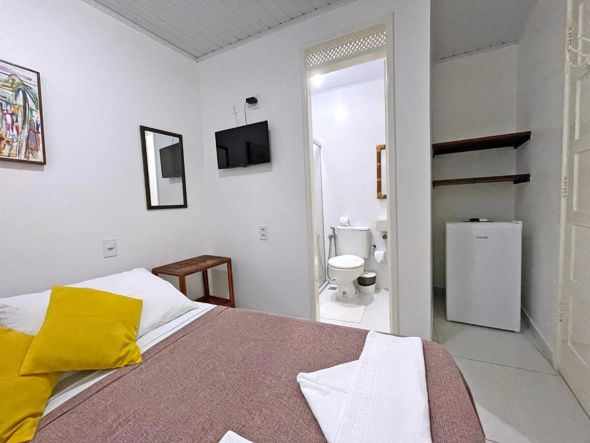 Bed in Pousada Aconchego