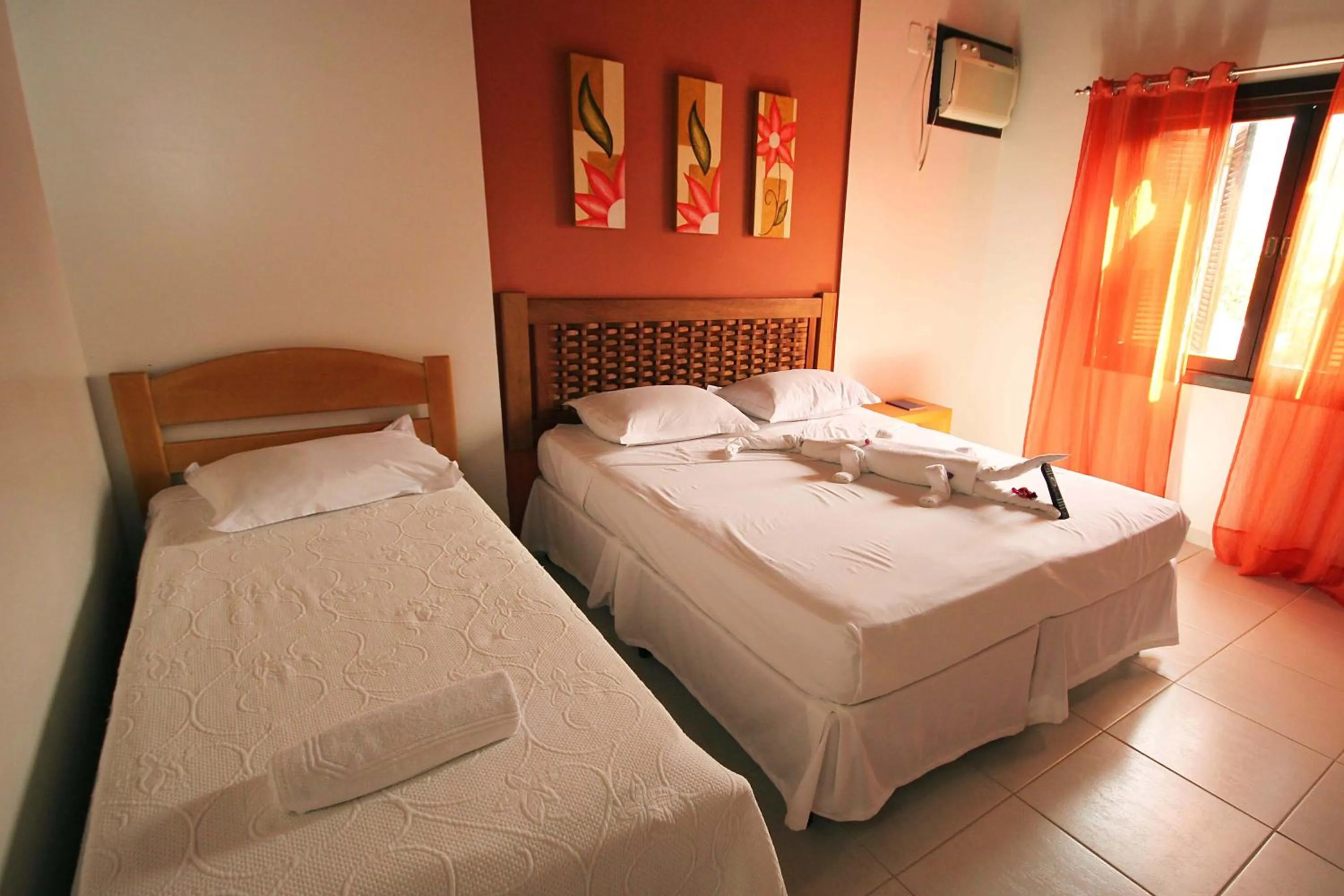 Bed in Pousada Jardim Porto Belo