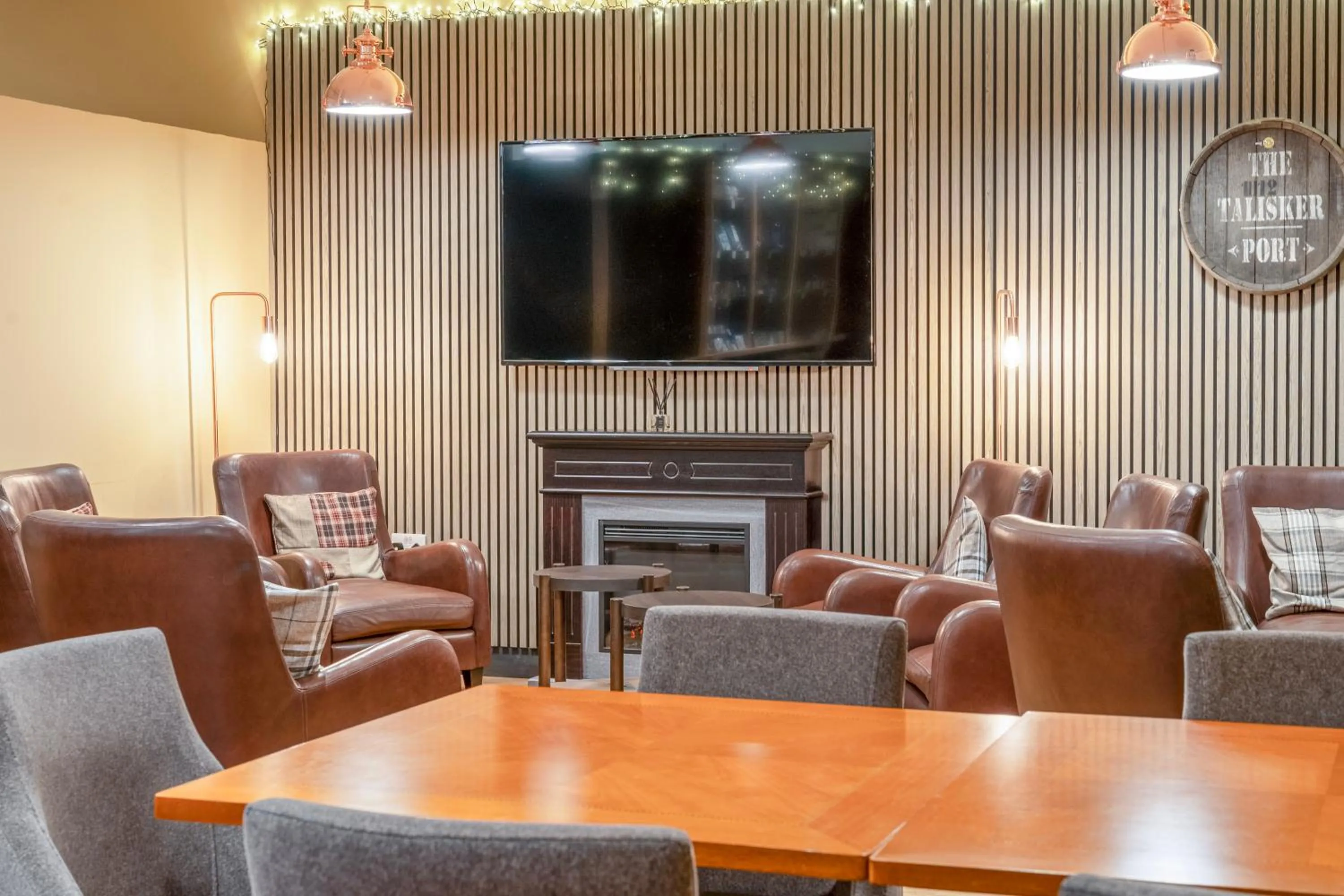 Communal lounge/ TV room in Coylumbridge Resort Hotel