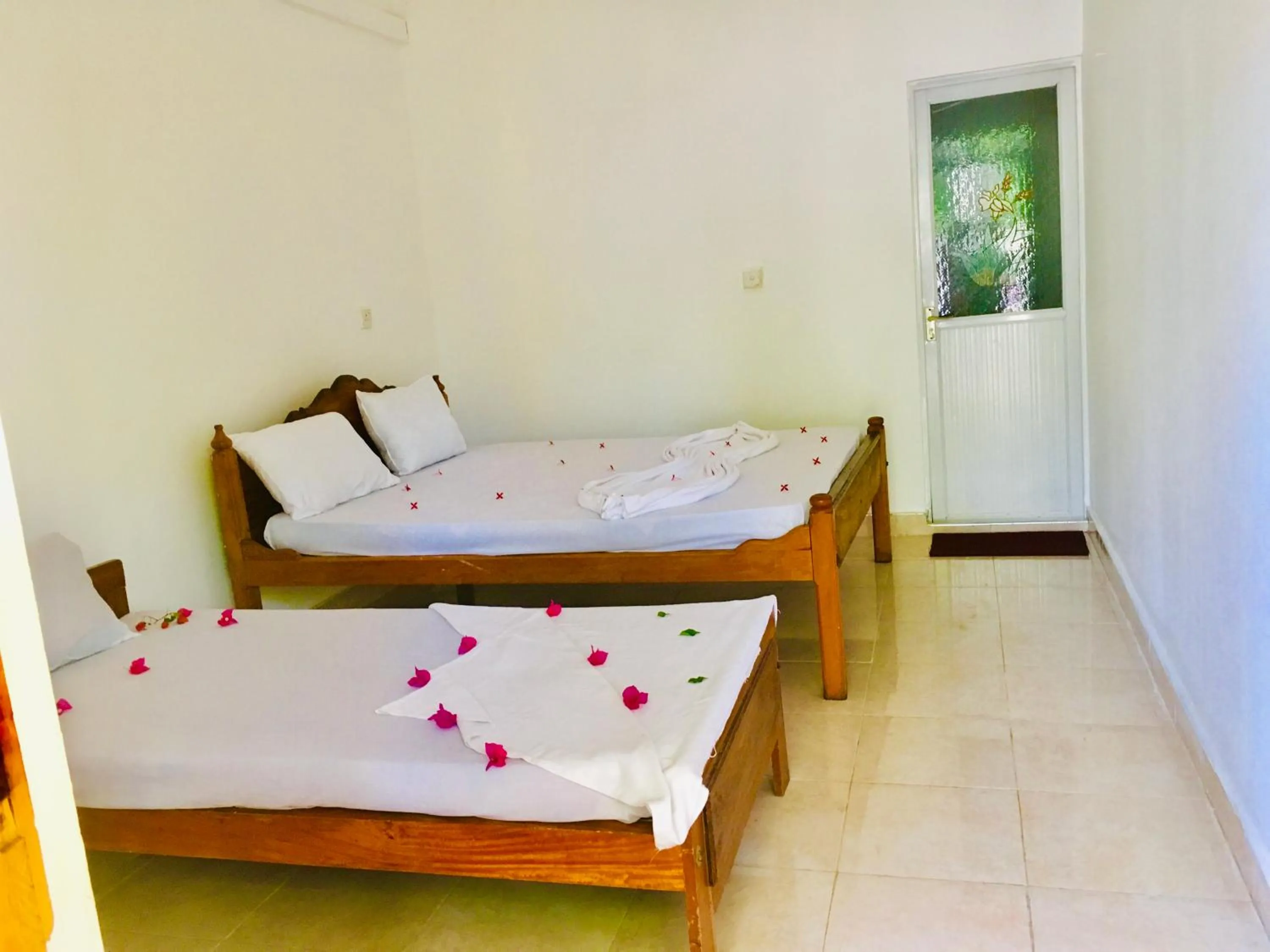 Bed in Shashini Beach Resort