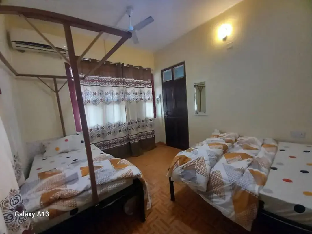 Deluxe Triple Room in Rafiki Apartment Deluxe Triple Room in Rafiki Apartment