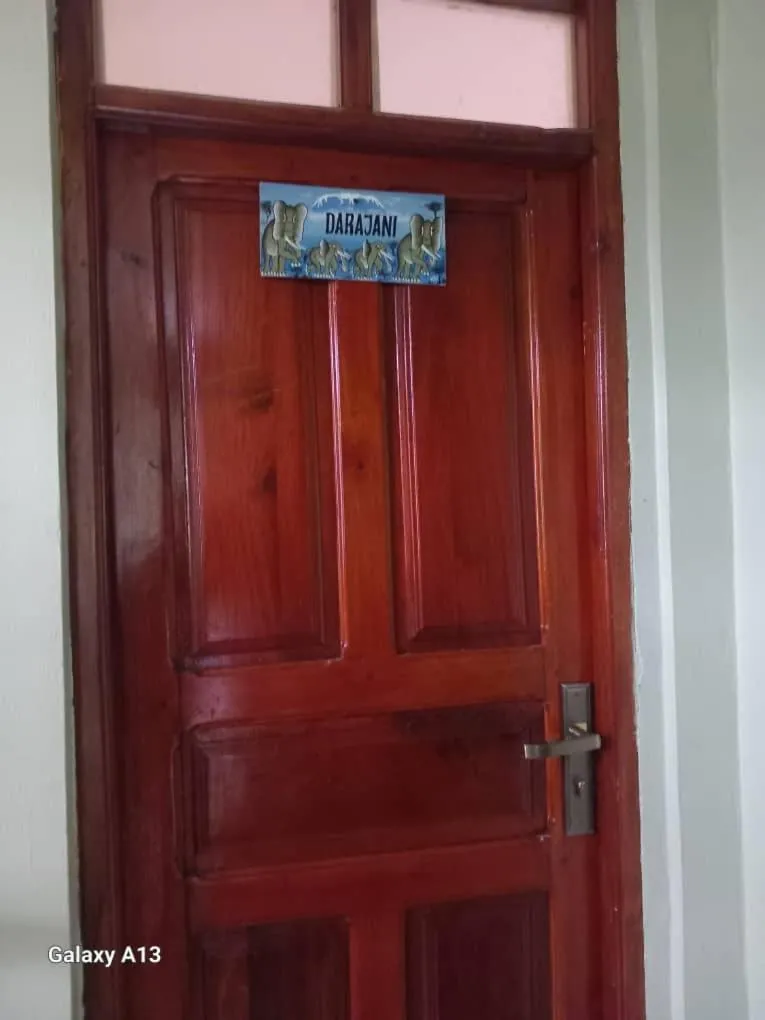 Property logo or sign in Rafiki Apartment