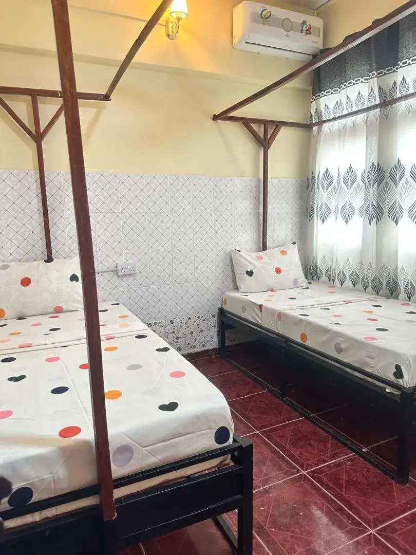 Premium Quadruple Room in Rafiki Apartment Premium Quadruple Room in Rafiki Apartment