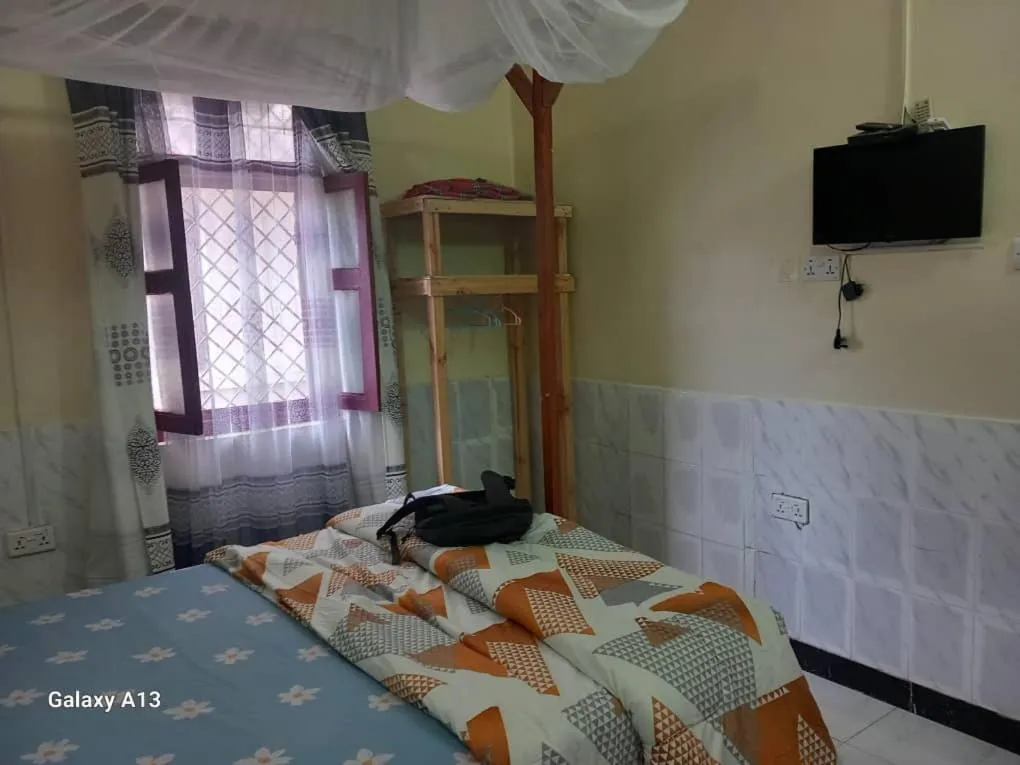 Photo of the whole room, Bed in Rafiki Apartment