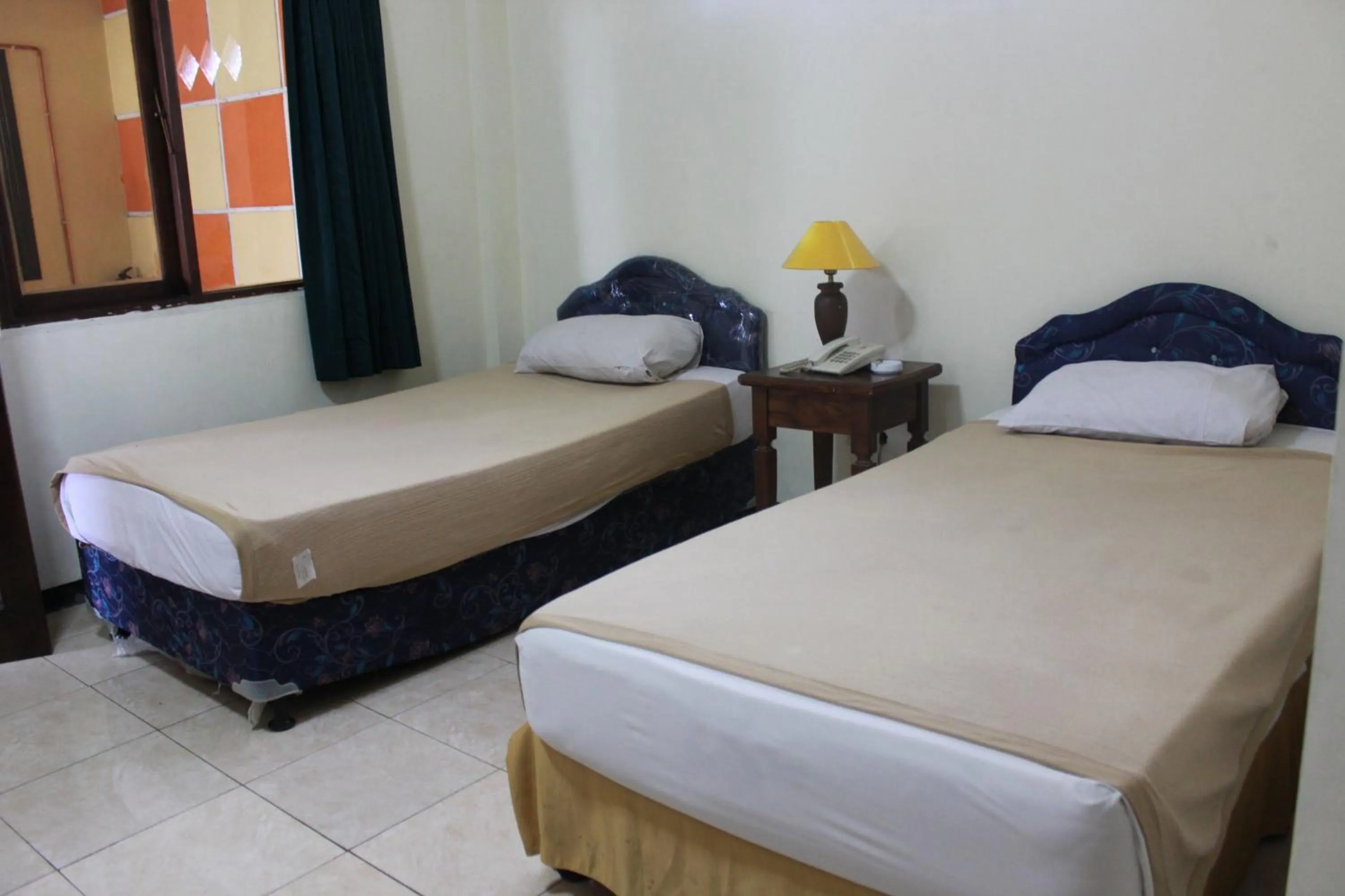 Bed in Hotel Ronggolawe